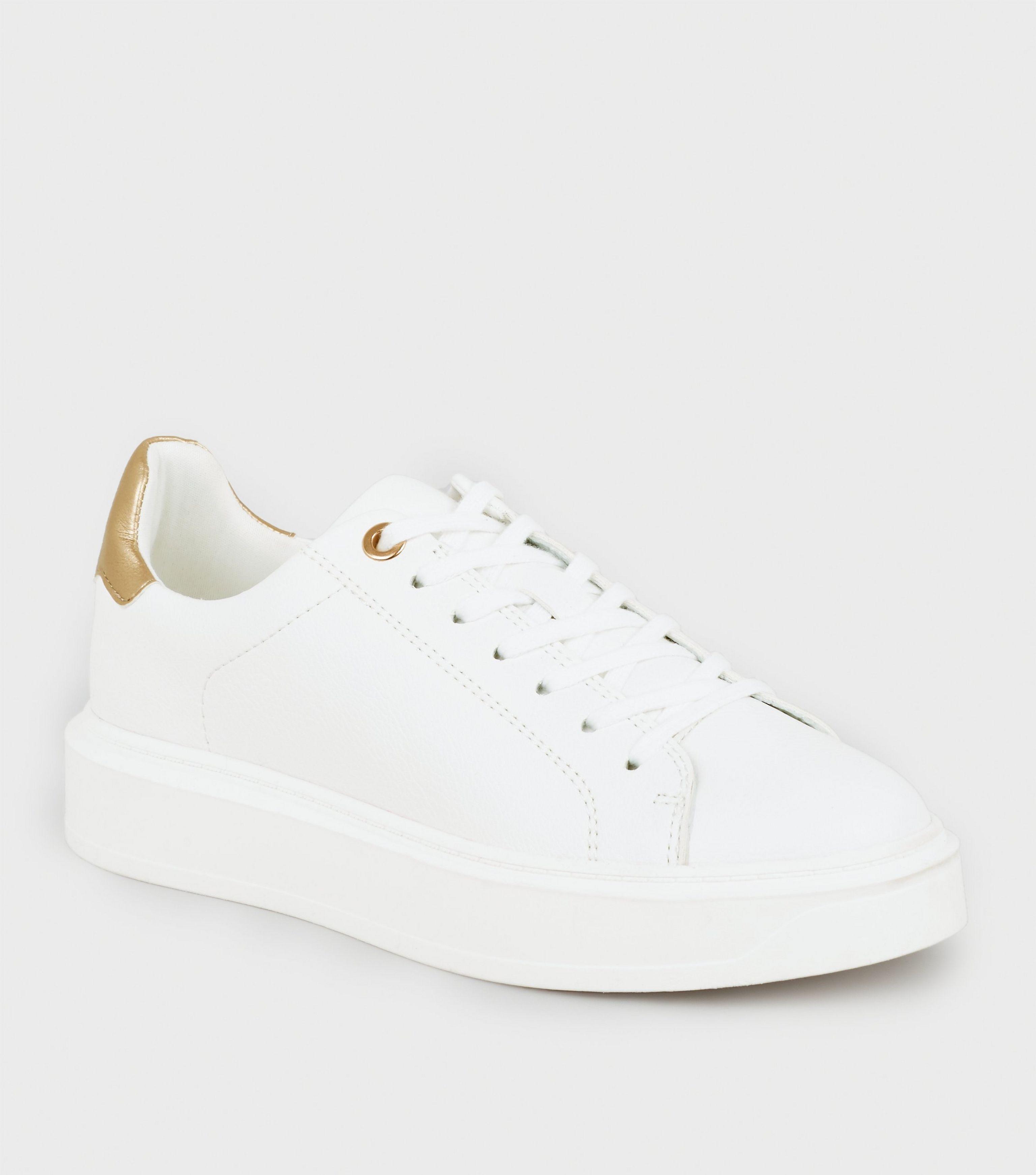 white leather look trainers