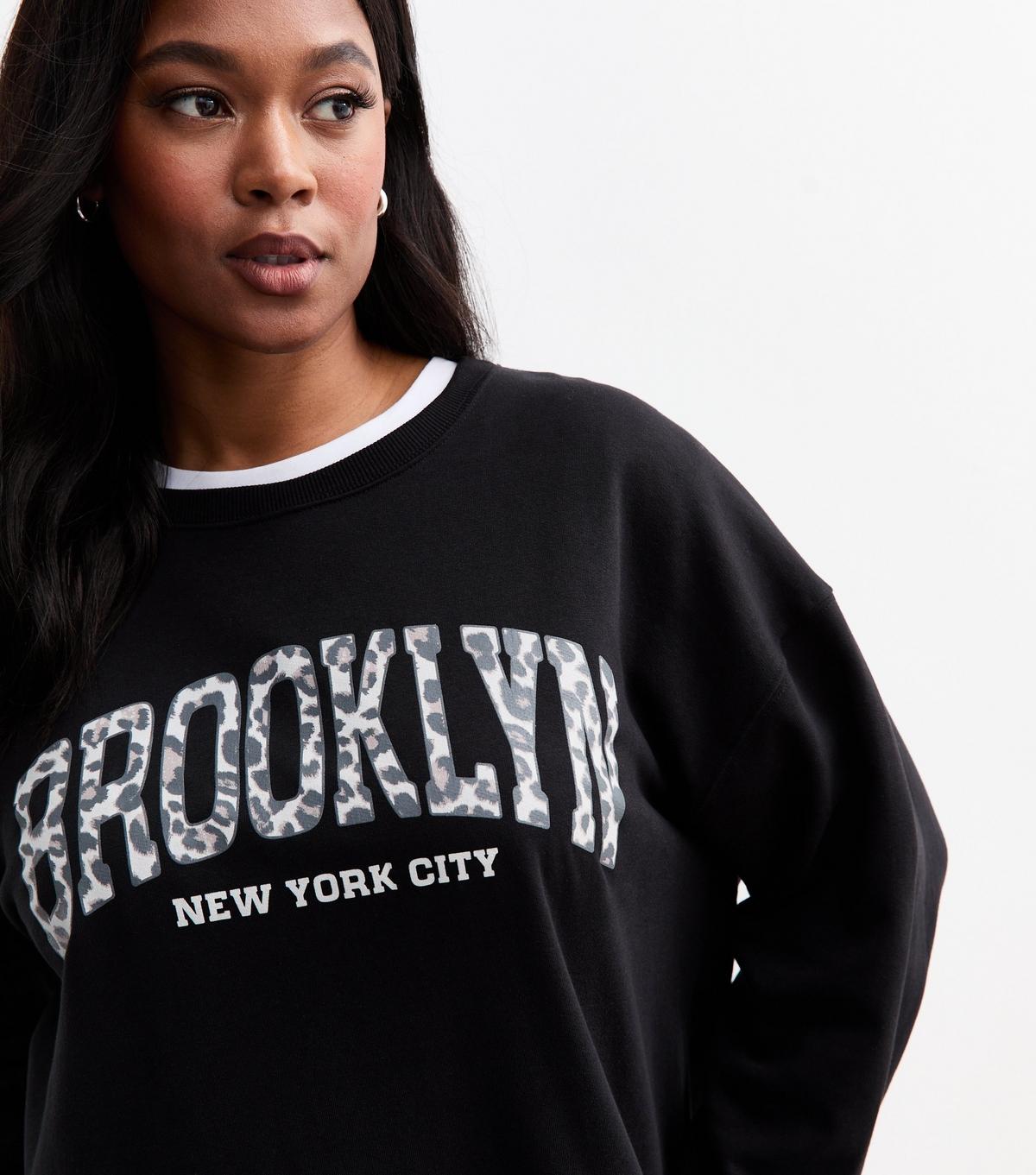 New Look Plus Size Brooklyn Print Jersey Sweatshirt Curves in Black Lyst UK