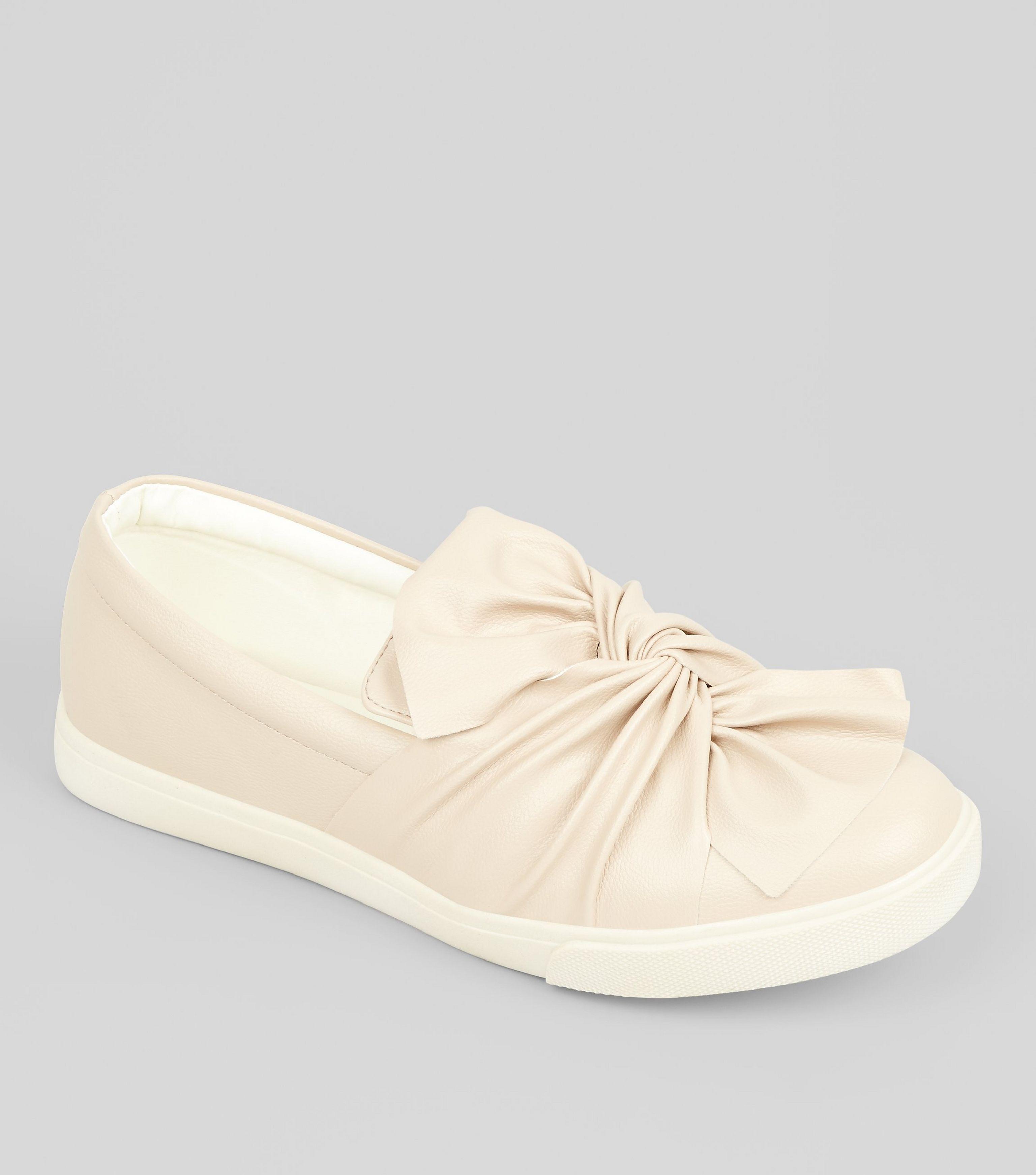 bow front slip on trainers