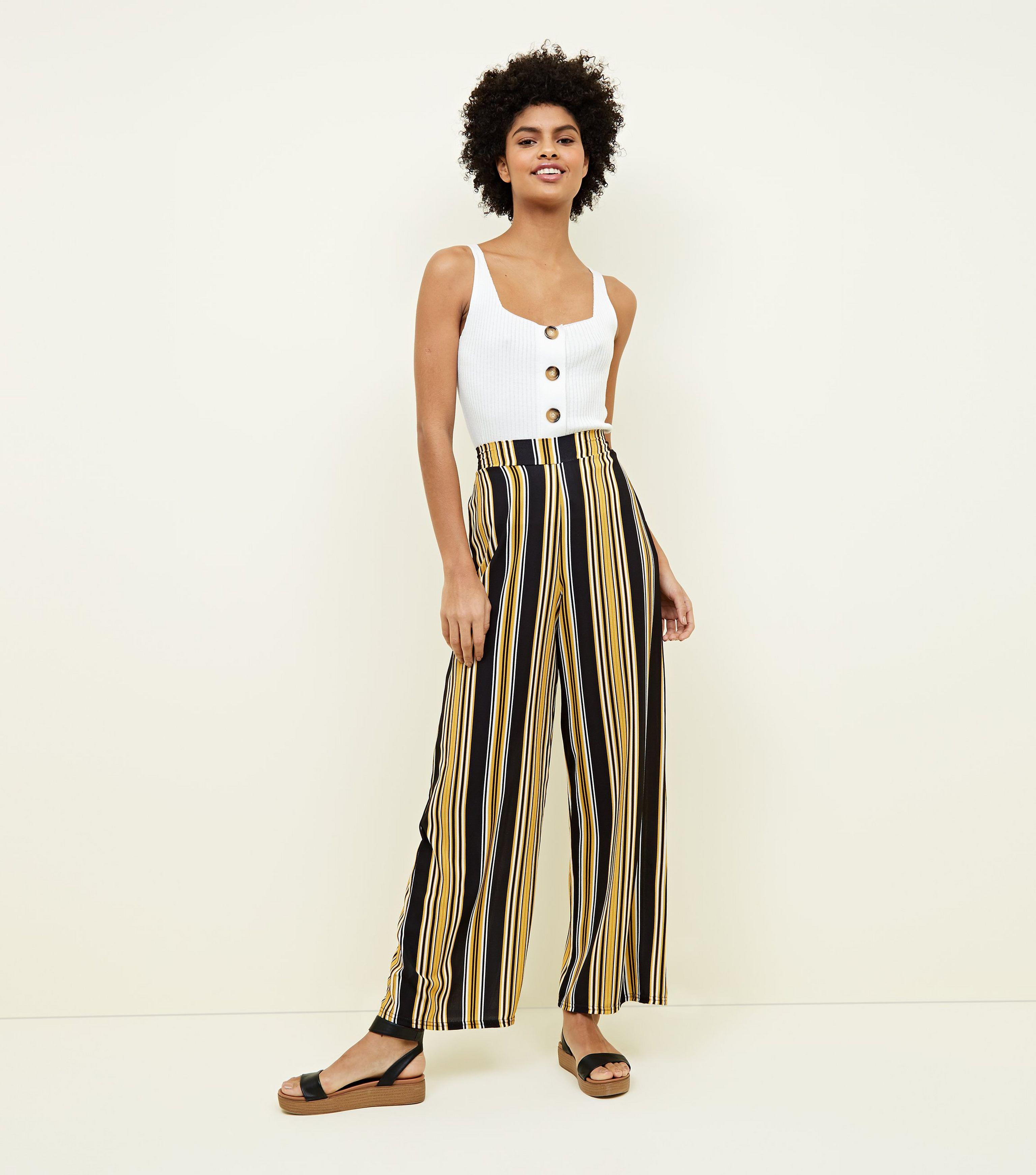 yellow and black striped trousers