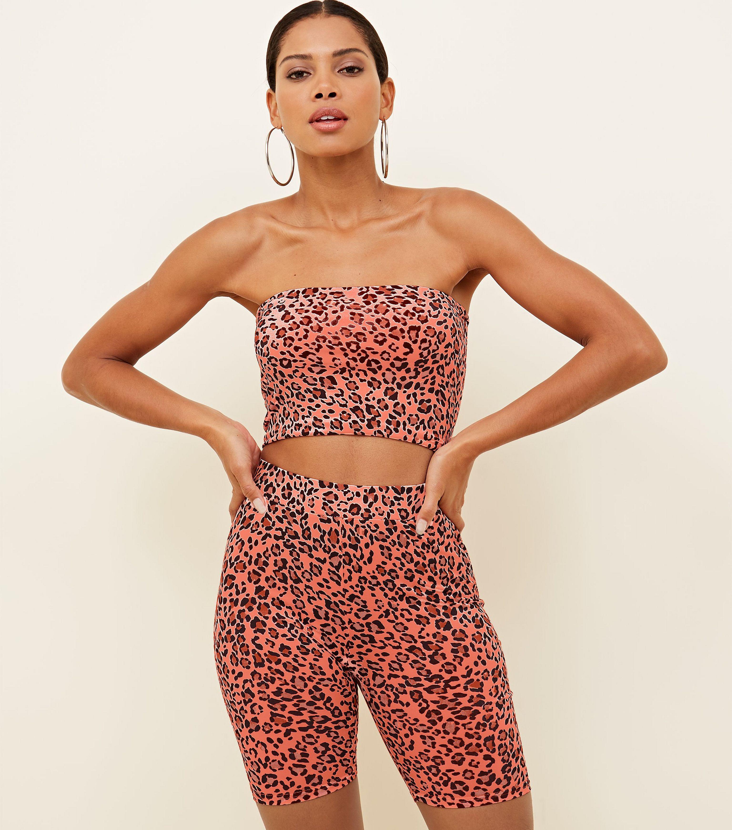 orange neon cycling shorts