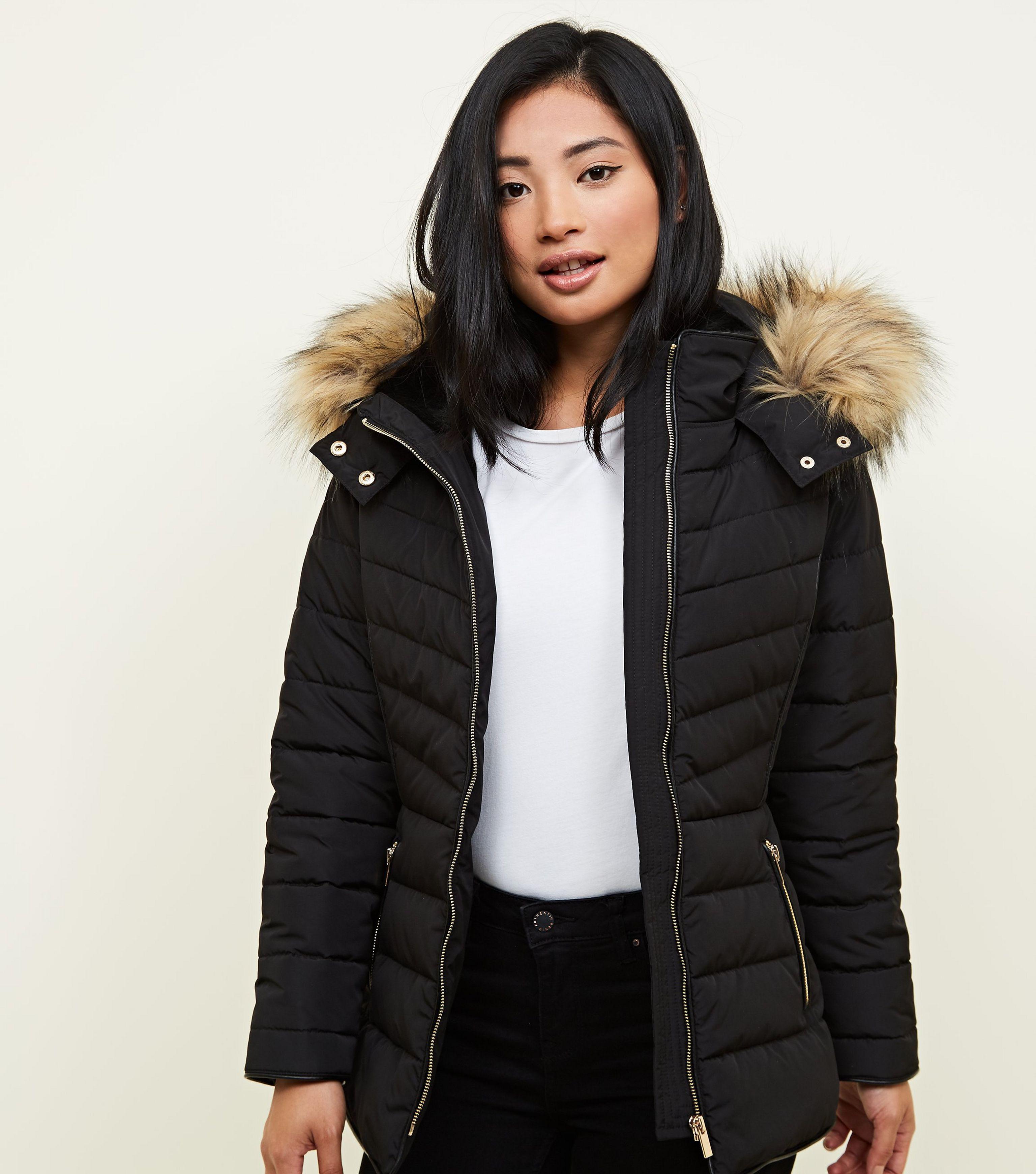 black fitted coat with fur hood