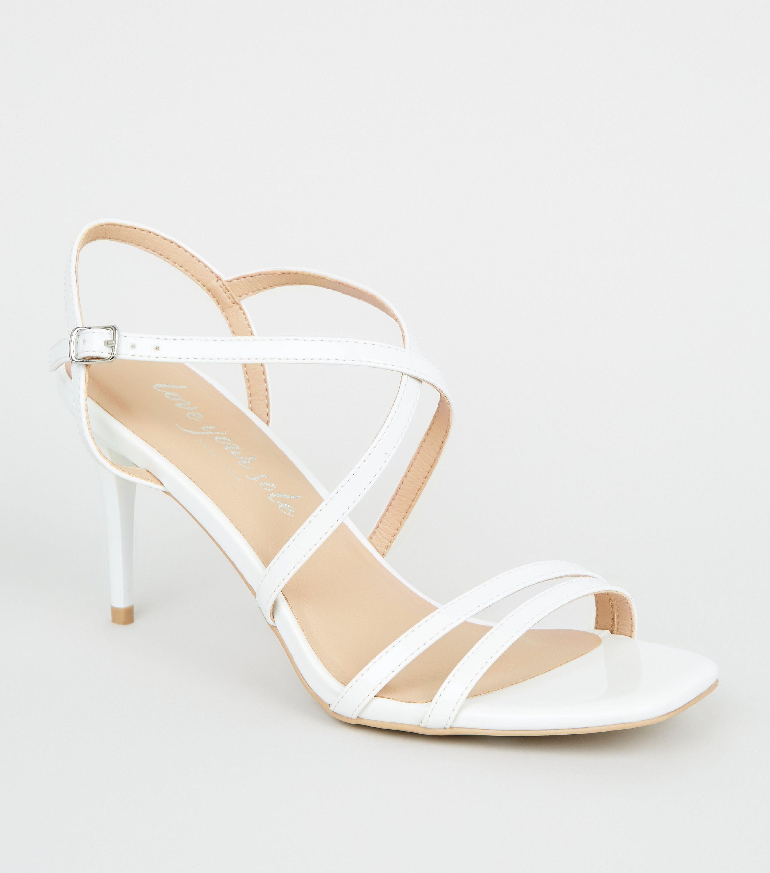 white stiletto sandals