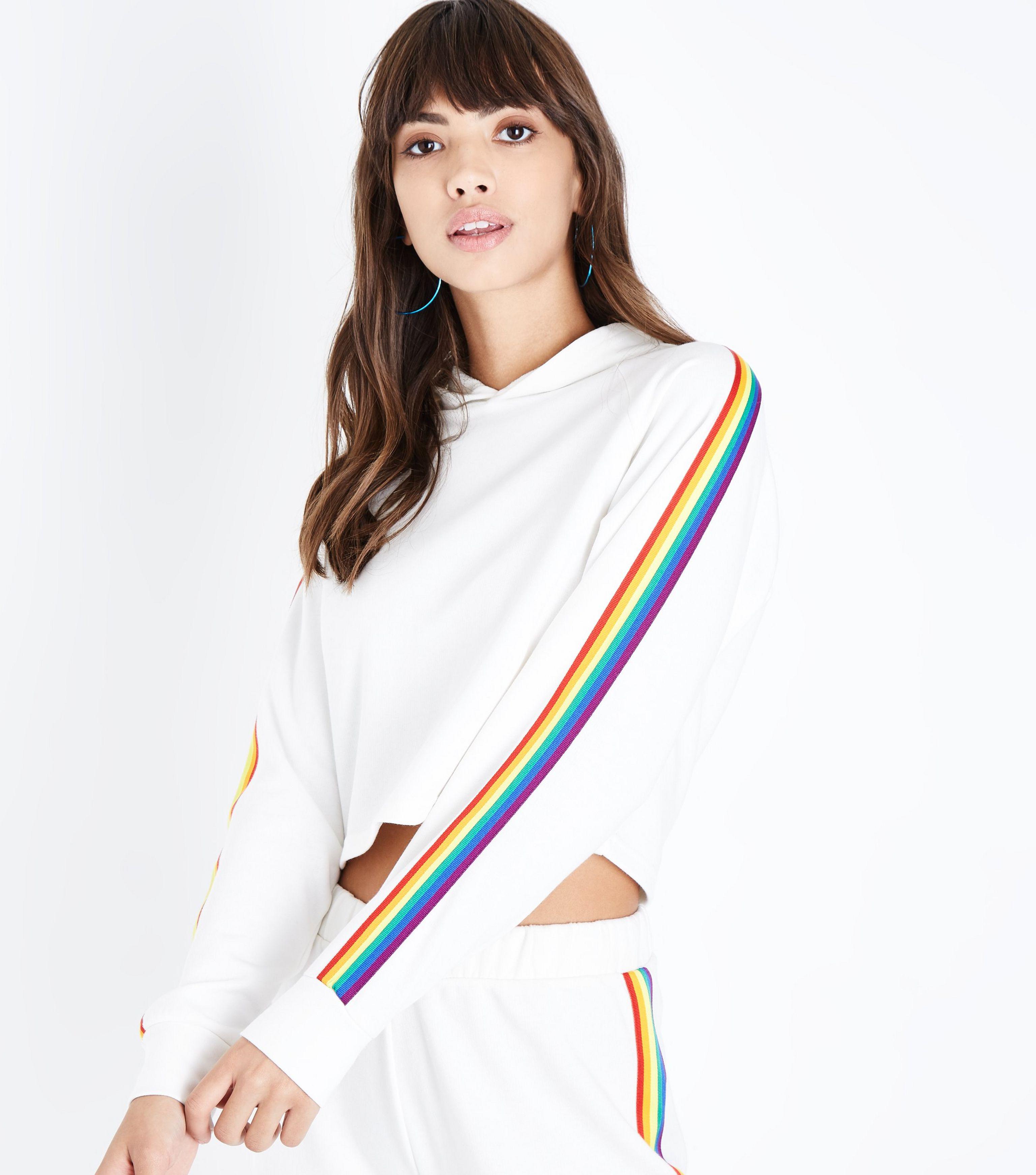 white hoodie with rainbow stripes