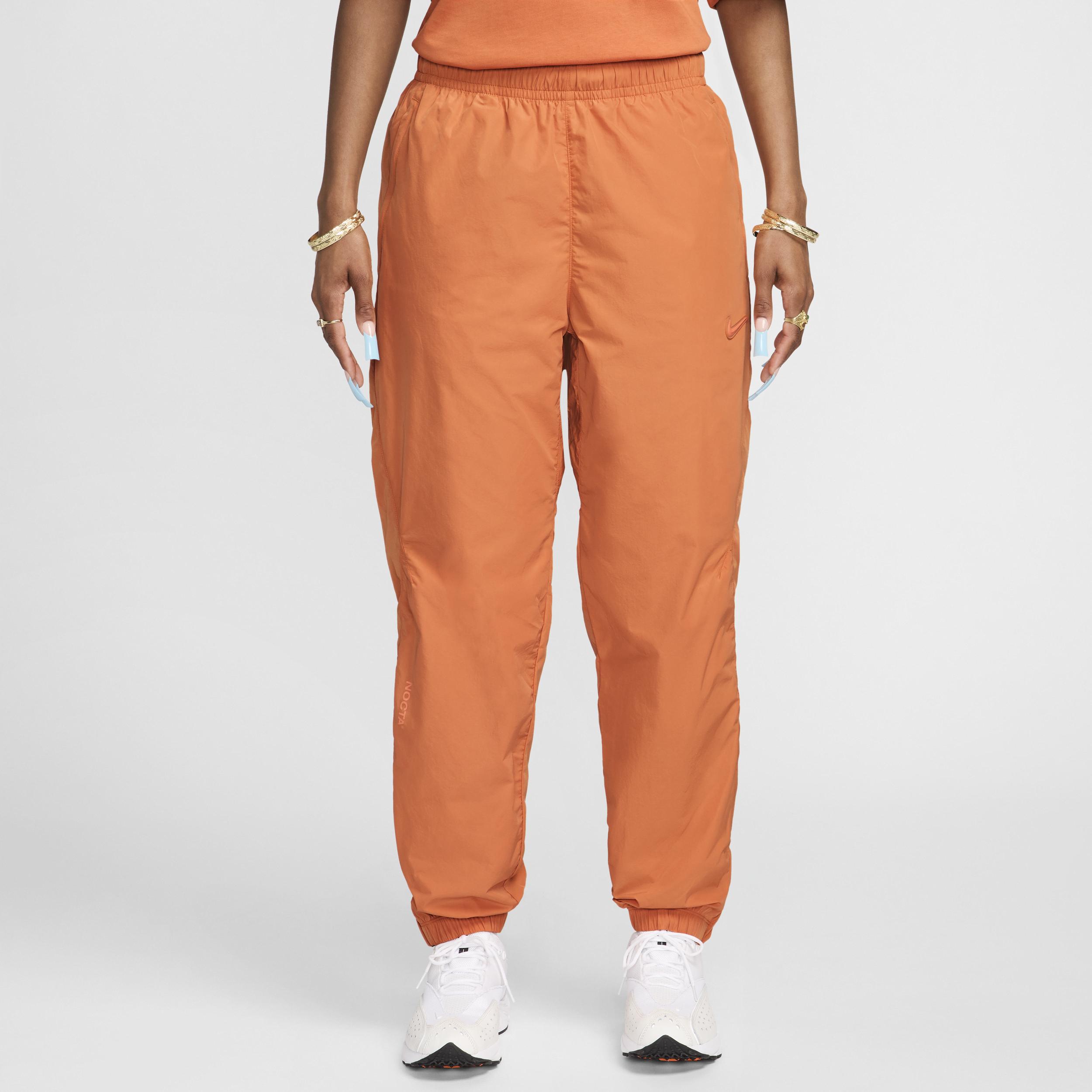 Nike Nocta Northstar Nylon Tracksuit Bottoms in Orange for Nike Nocta Northstar Nylon Tracksuit Bottoms in Orange for