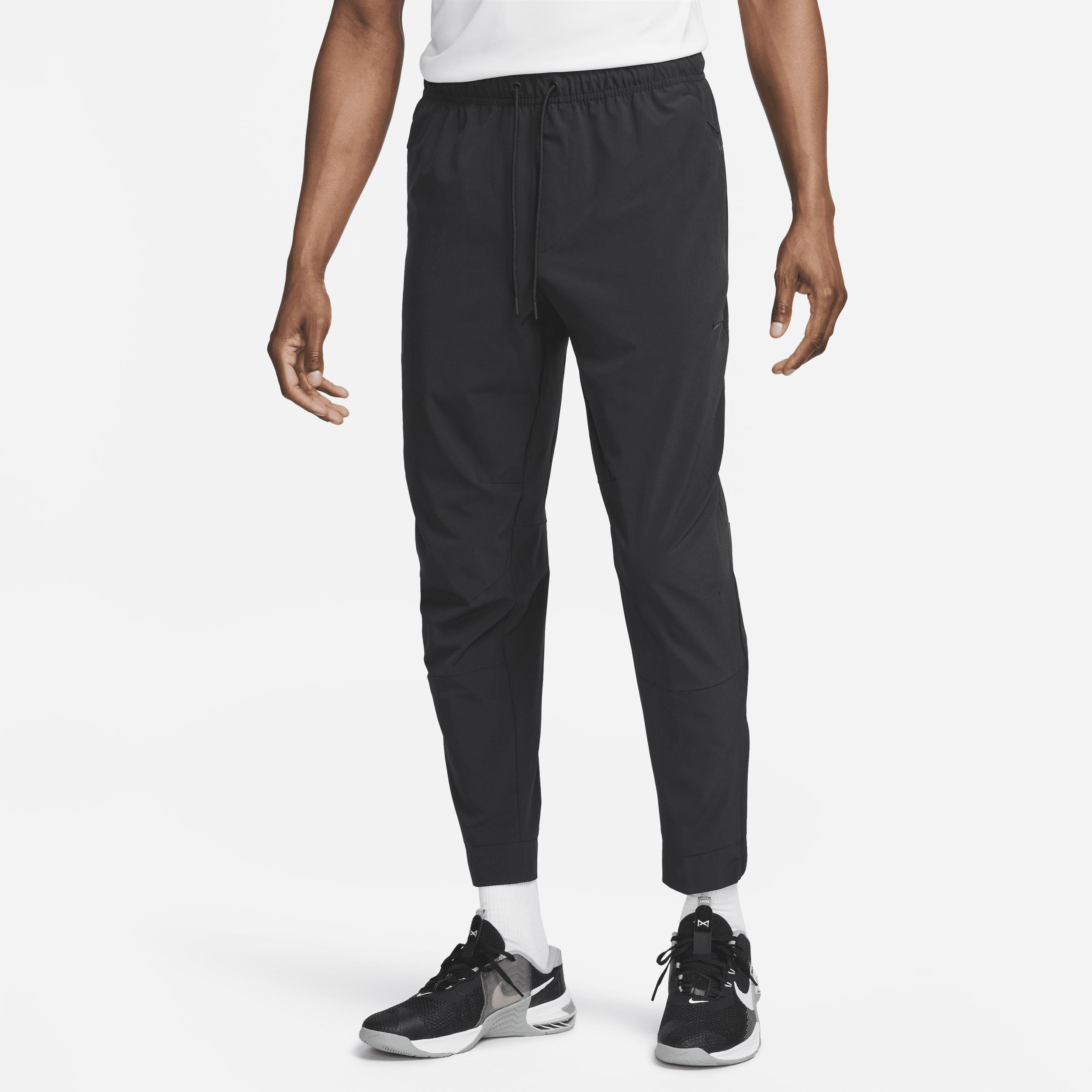 Nike Unlimited Dri-fit Zippered Cuff Versatile Pants in Black for Men ...