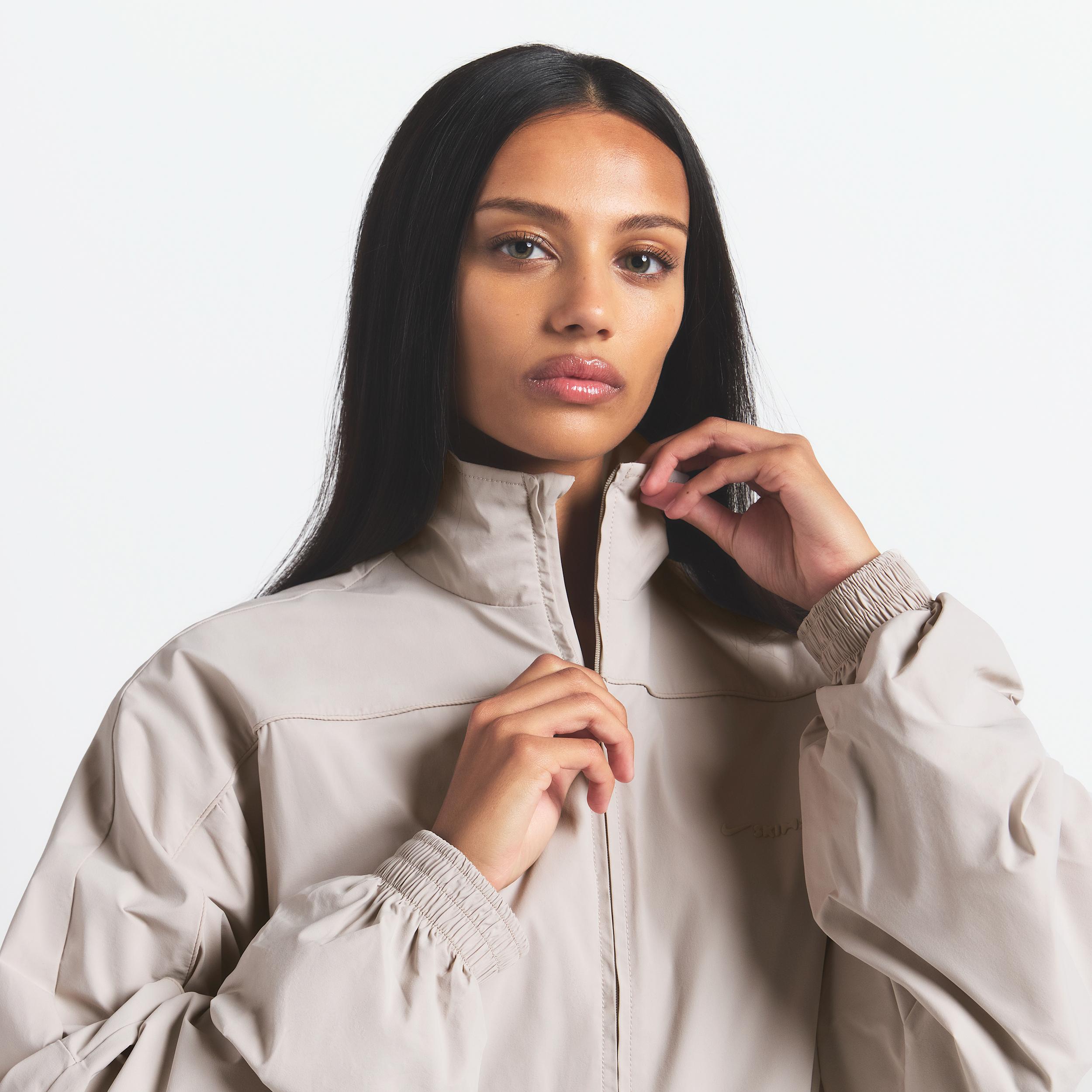 Nike Skims Woven Nylon Oversized Track Jacket in Natural | Lyst