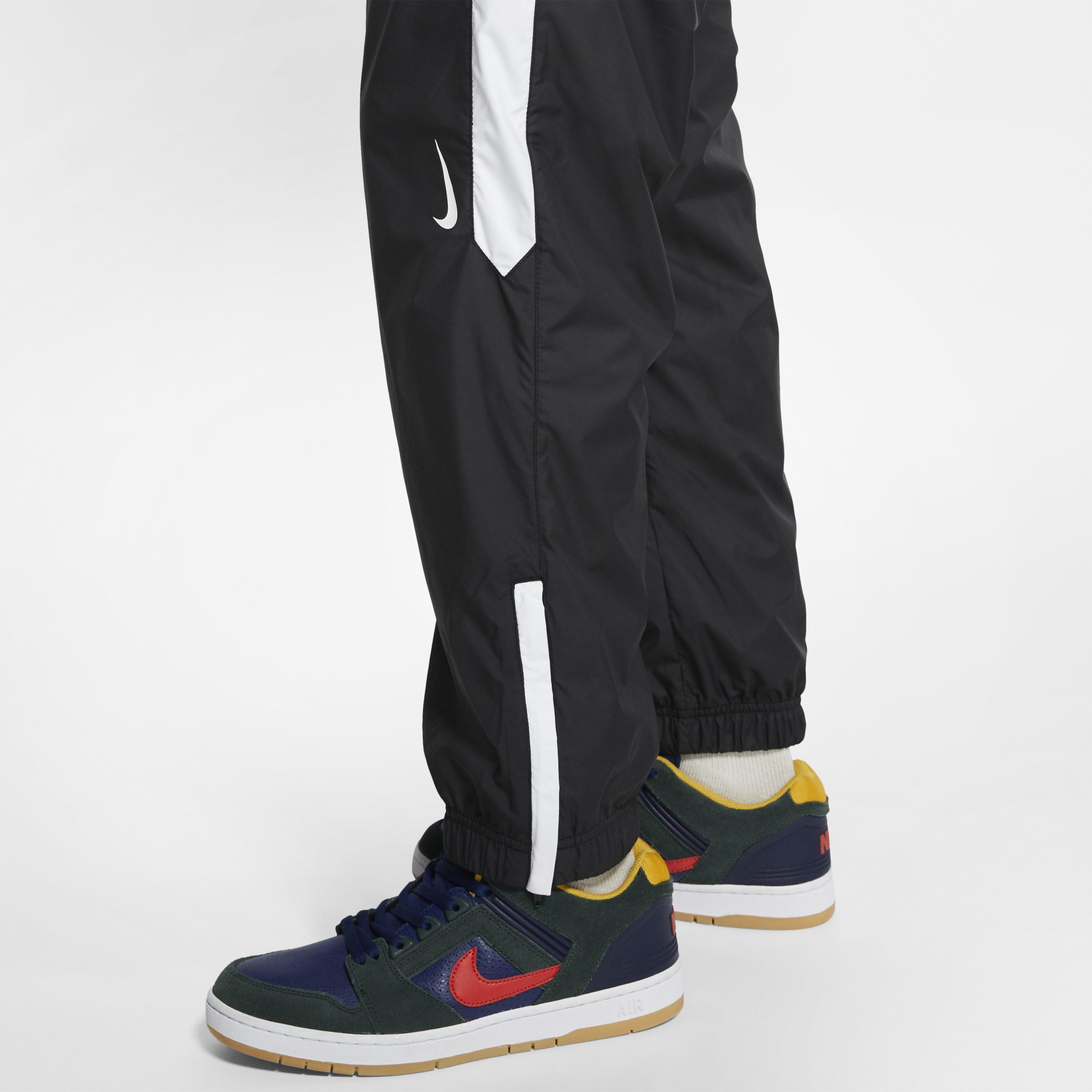 nike flared tracksuit bottoms