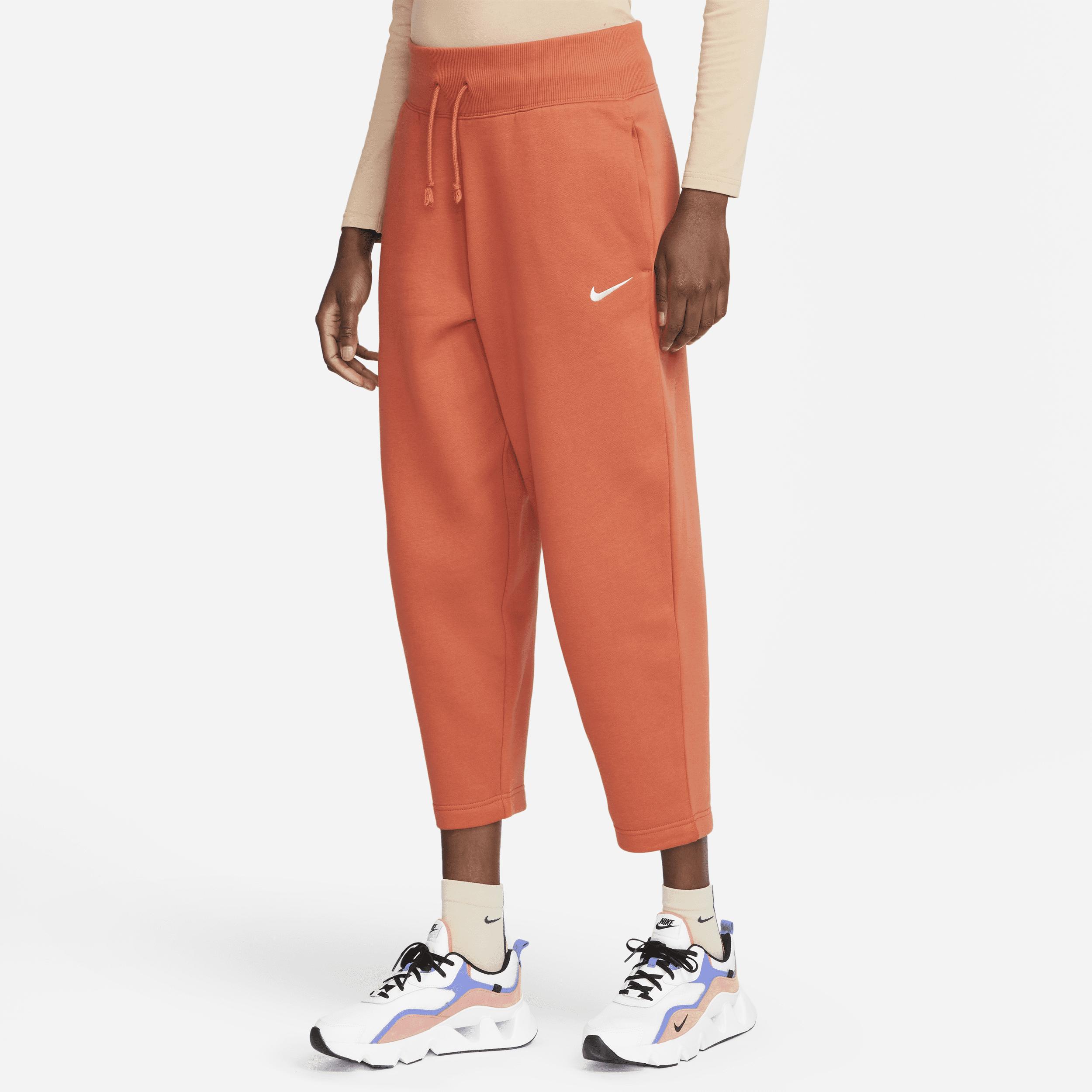 Pantaloni tuta curve a vita alta sportswear phoenix fleece di Nike in  Arancione | Lyst