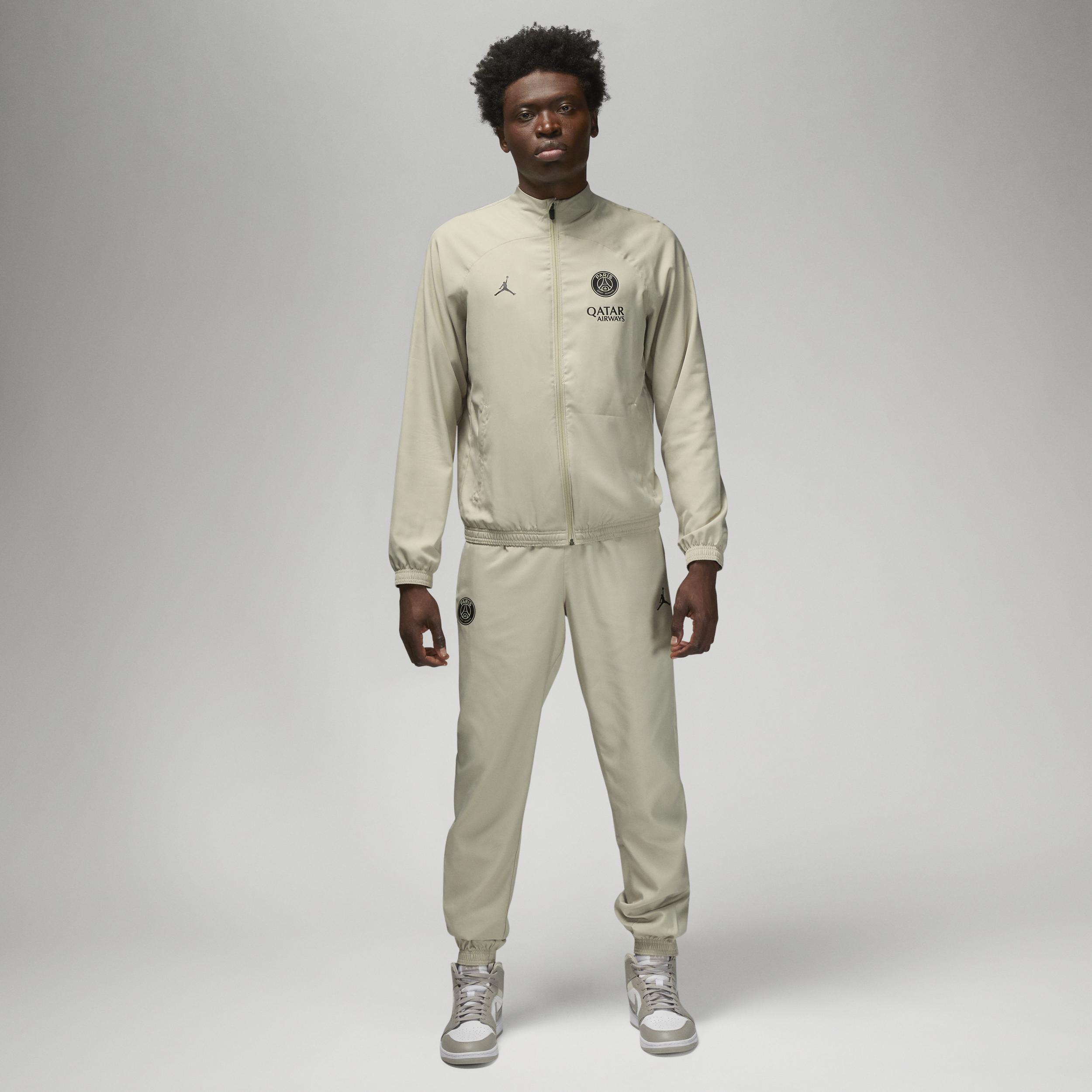 Nike cream tracksuit hot sale