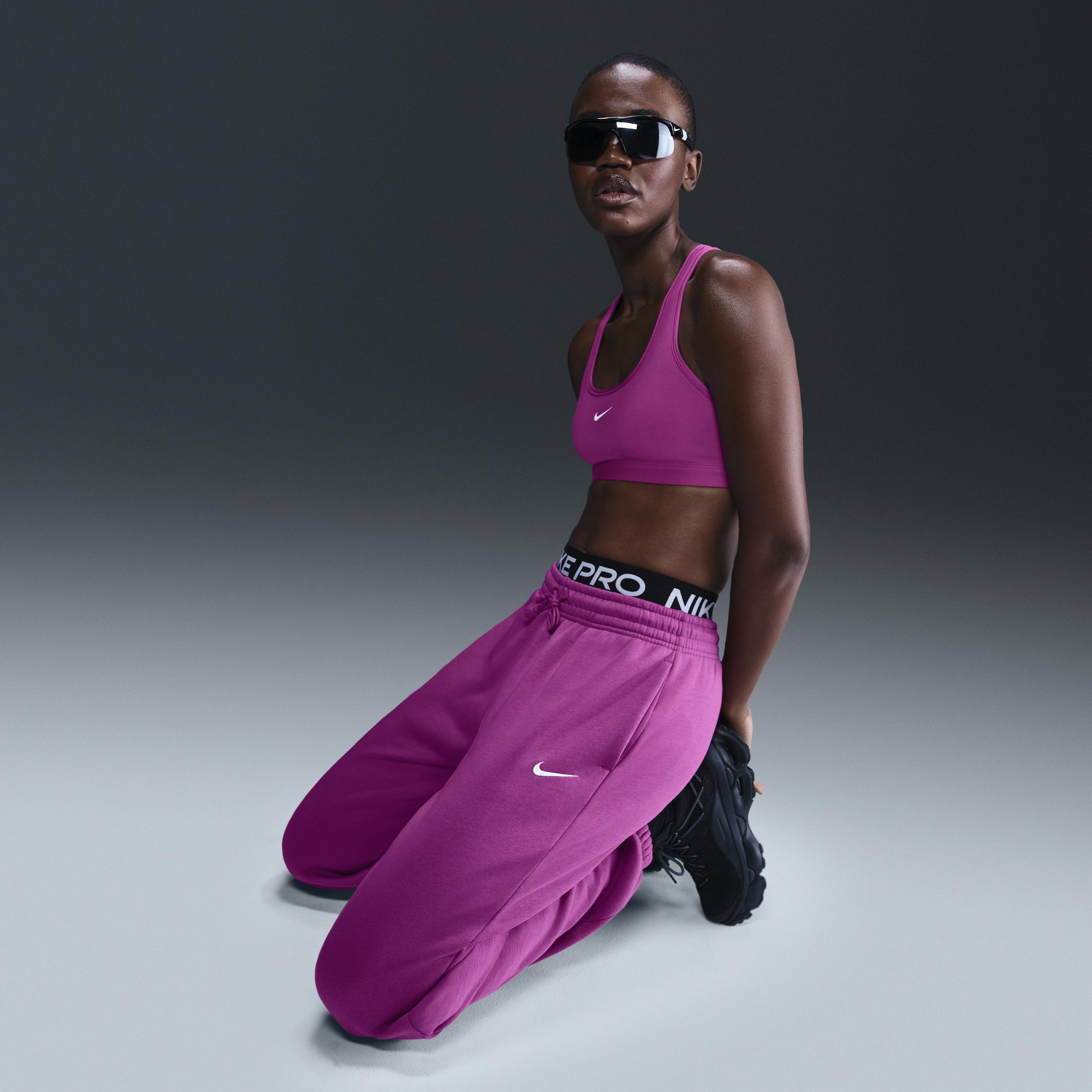 Pink nike tracksuit bottoms hotsell