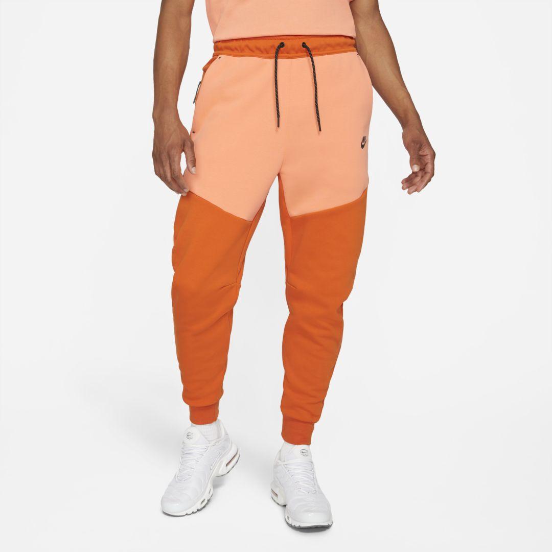 Nike Sportswear Fleece Joggers in Orange for Men - Lyst