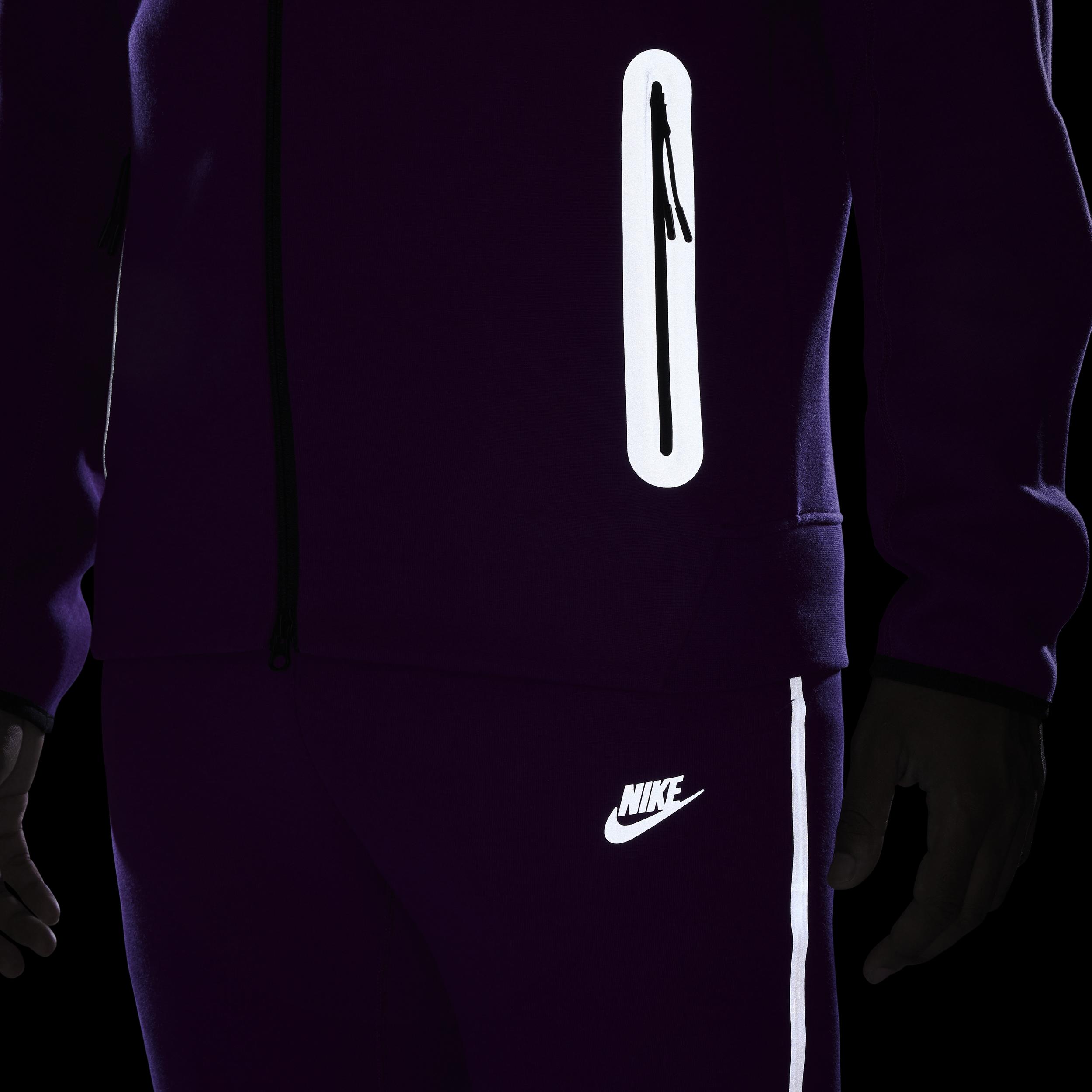 purple and black nike tech