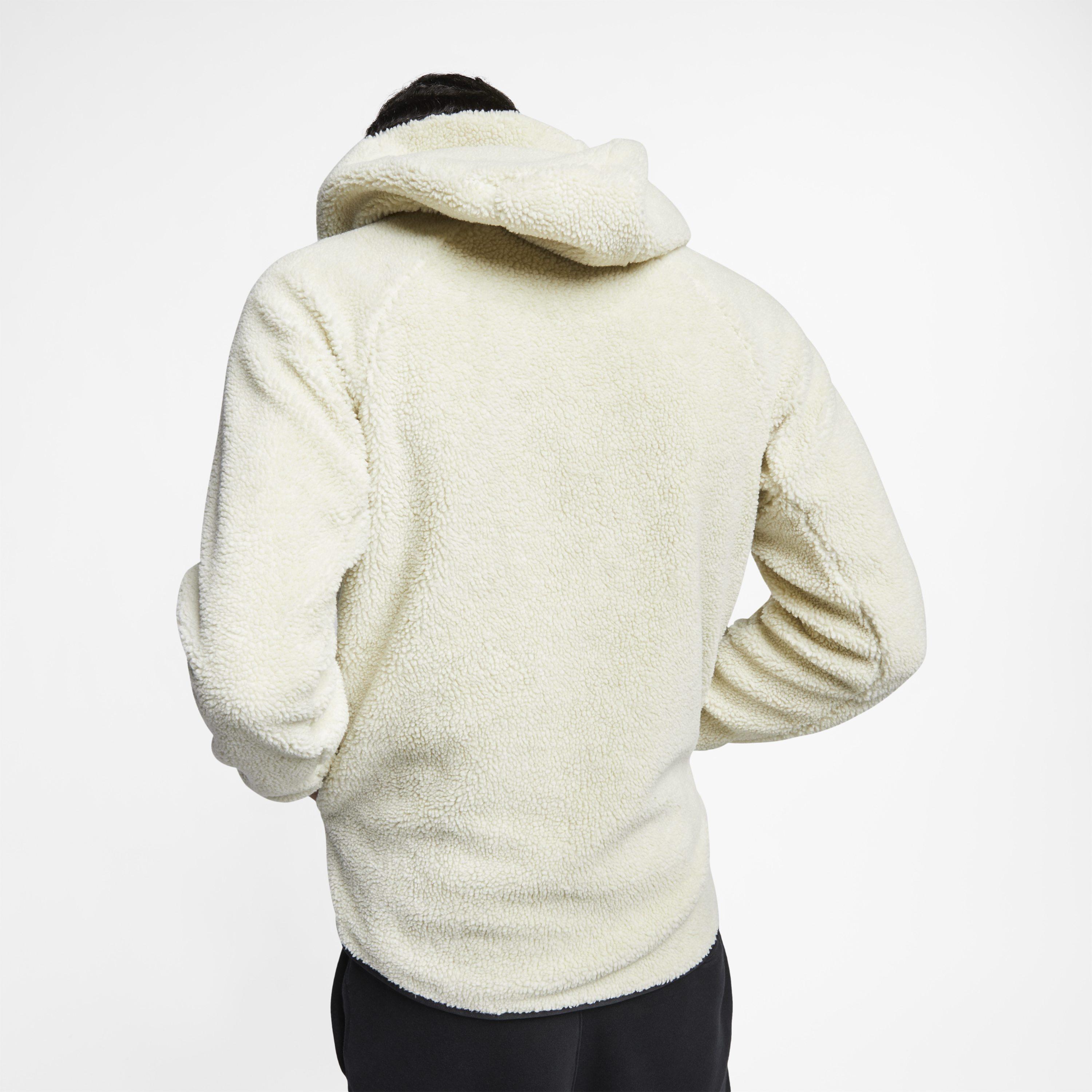 cream nike tech