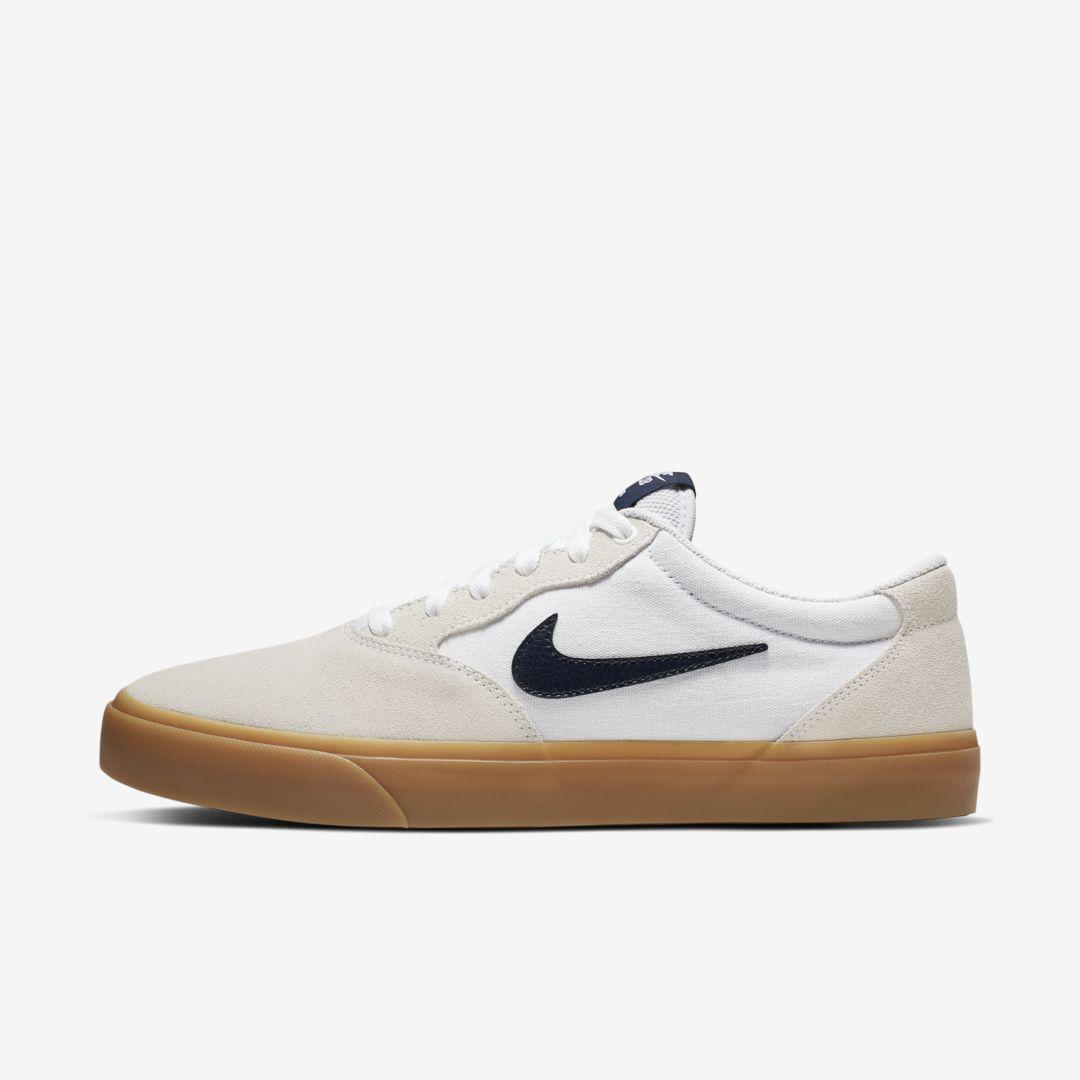 white nikes with brown sole