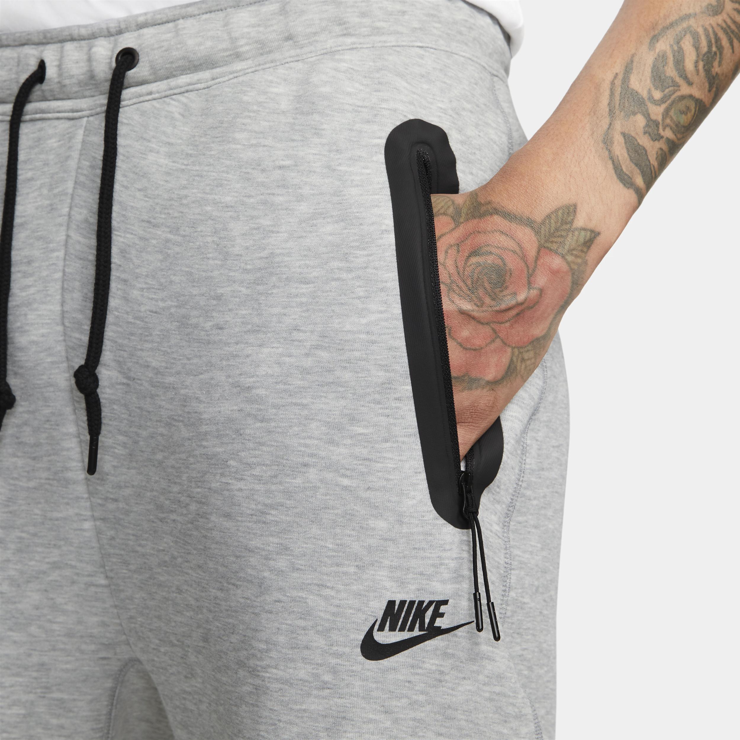 Nike fleece tracksuit bottoms sales