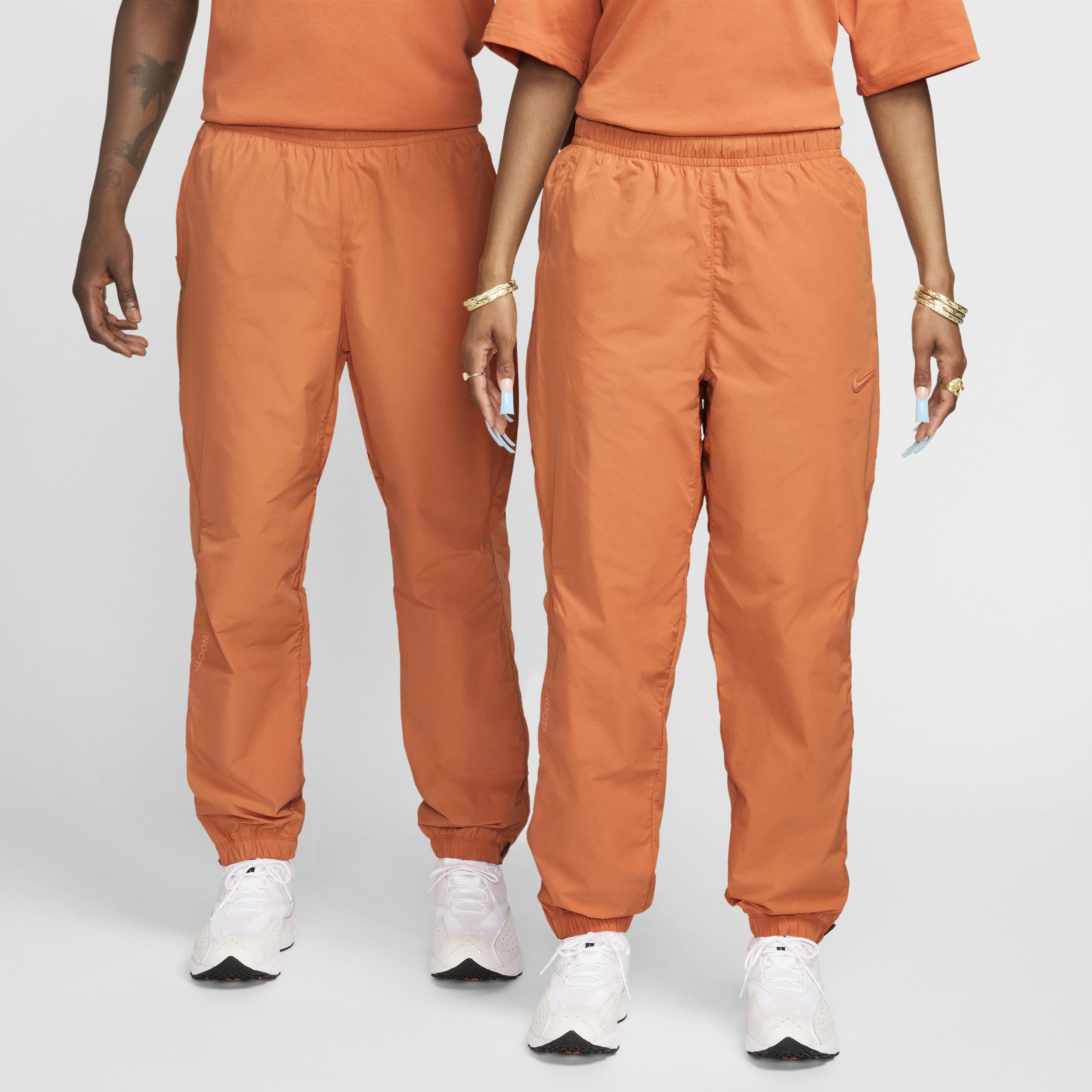 Nike Nocta Northstar Nylon Tracksuit Bottoms in Orange for Nike Nocta Northstar Nylon Tracksuit Bottoms in Orange for