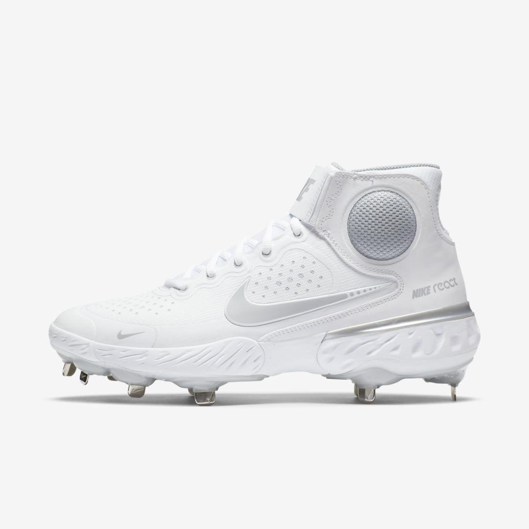 white plastic baseball cleats