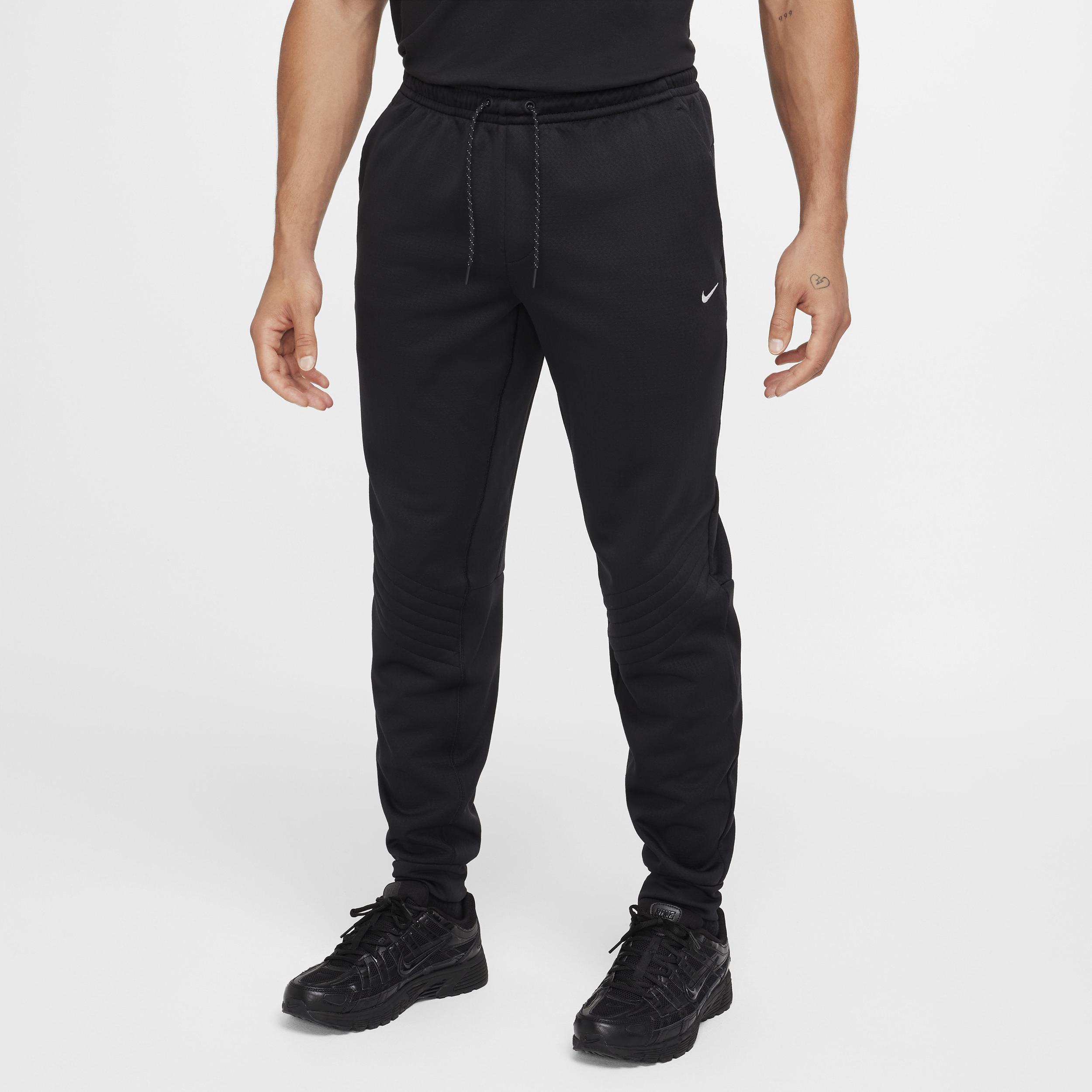 Nike water repellent pants online