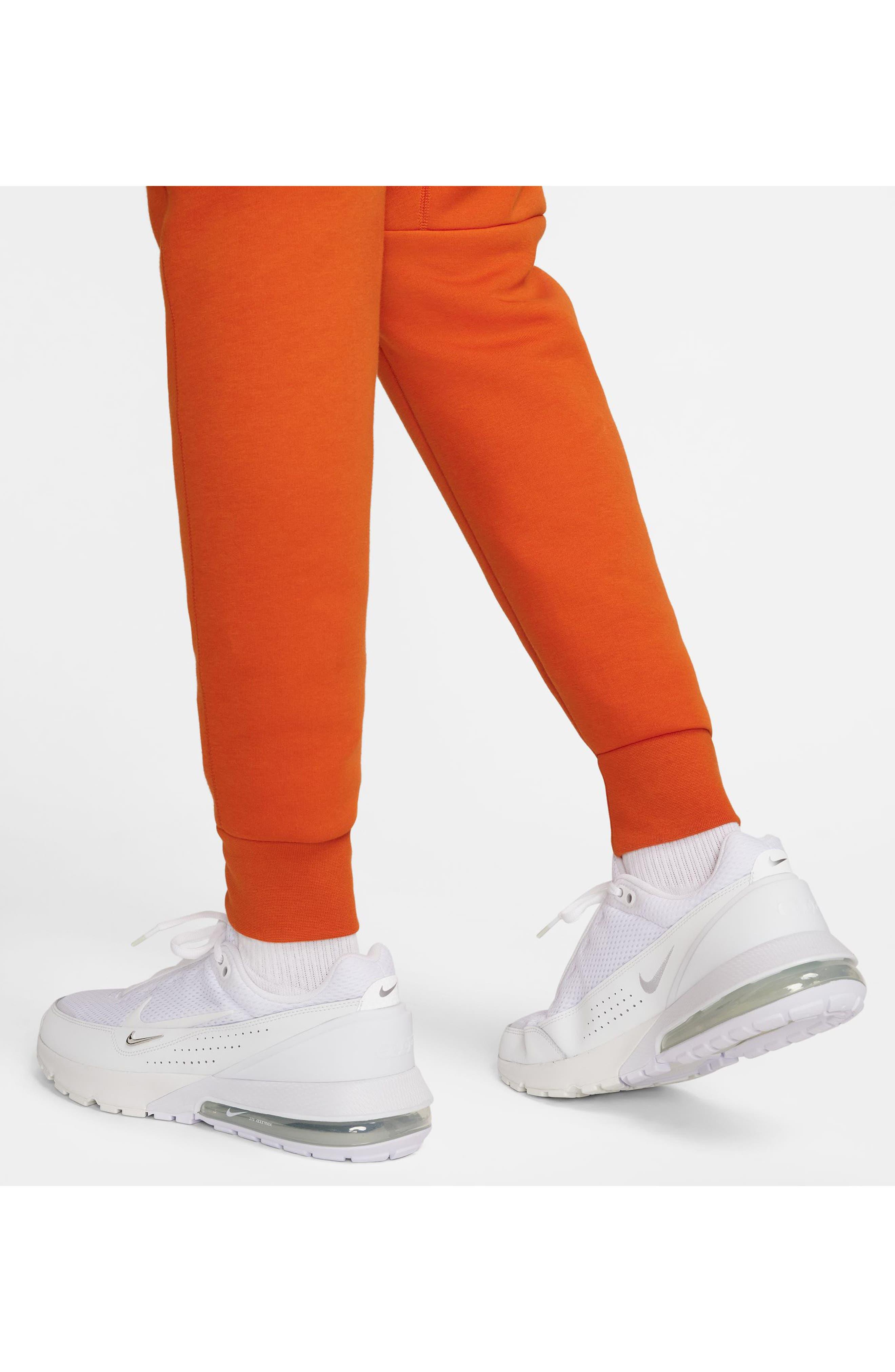 Nike Tech Fleece joggers in Orange for Men | Lyst