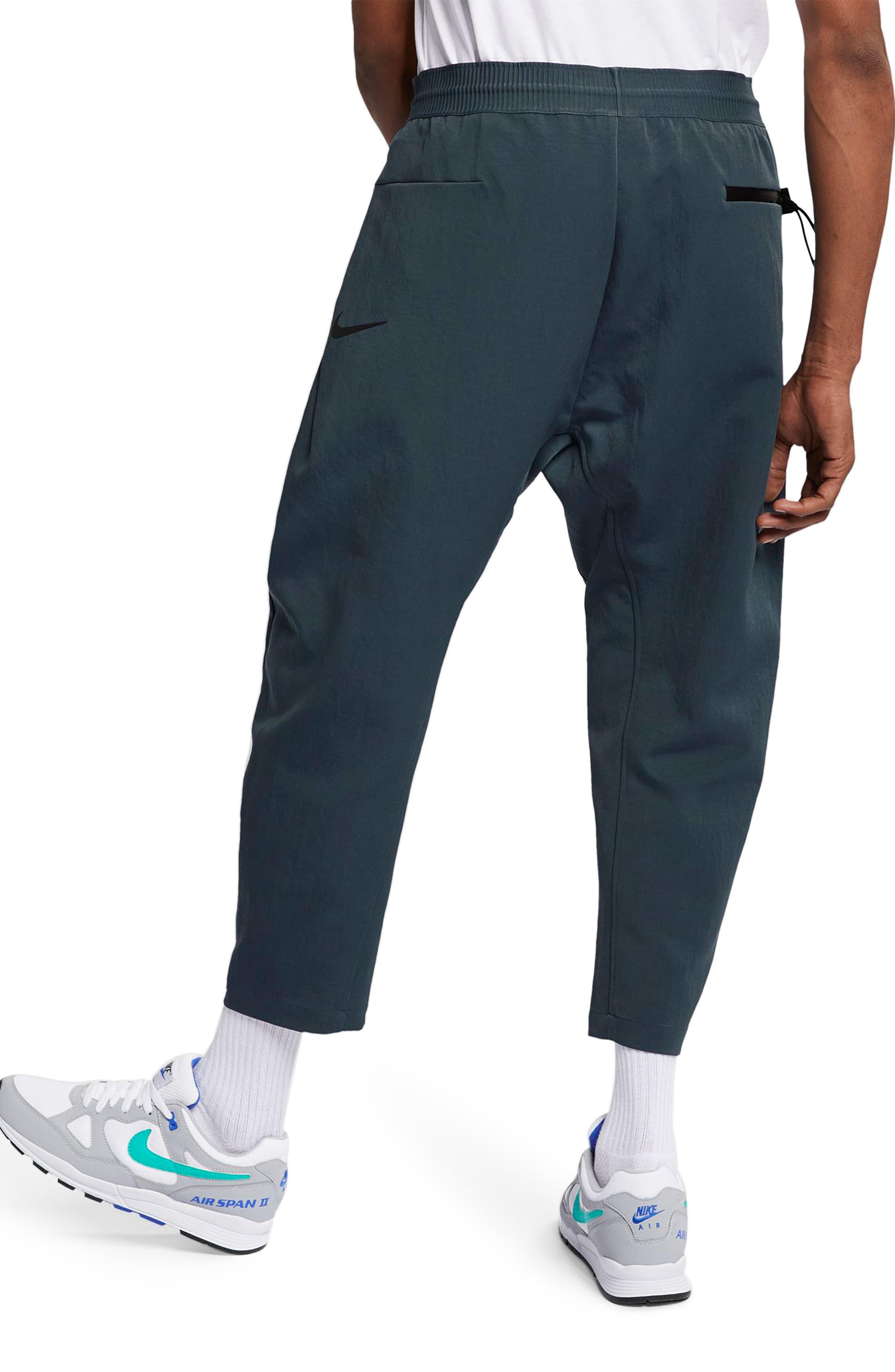 nike tech pack cropped woven pants