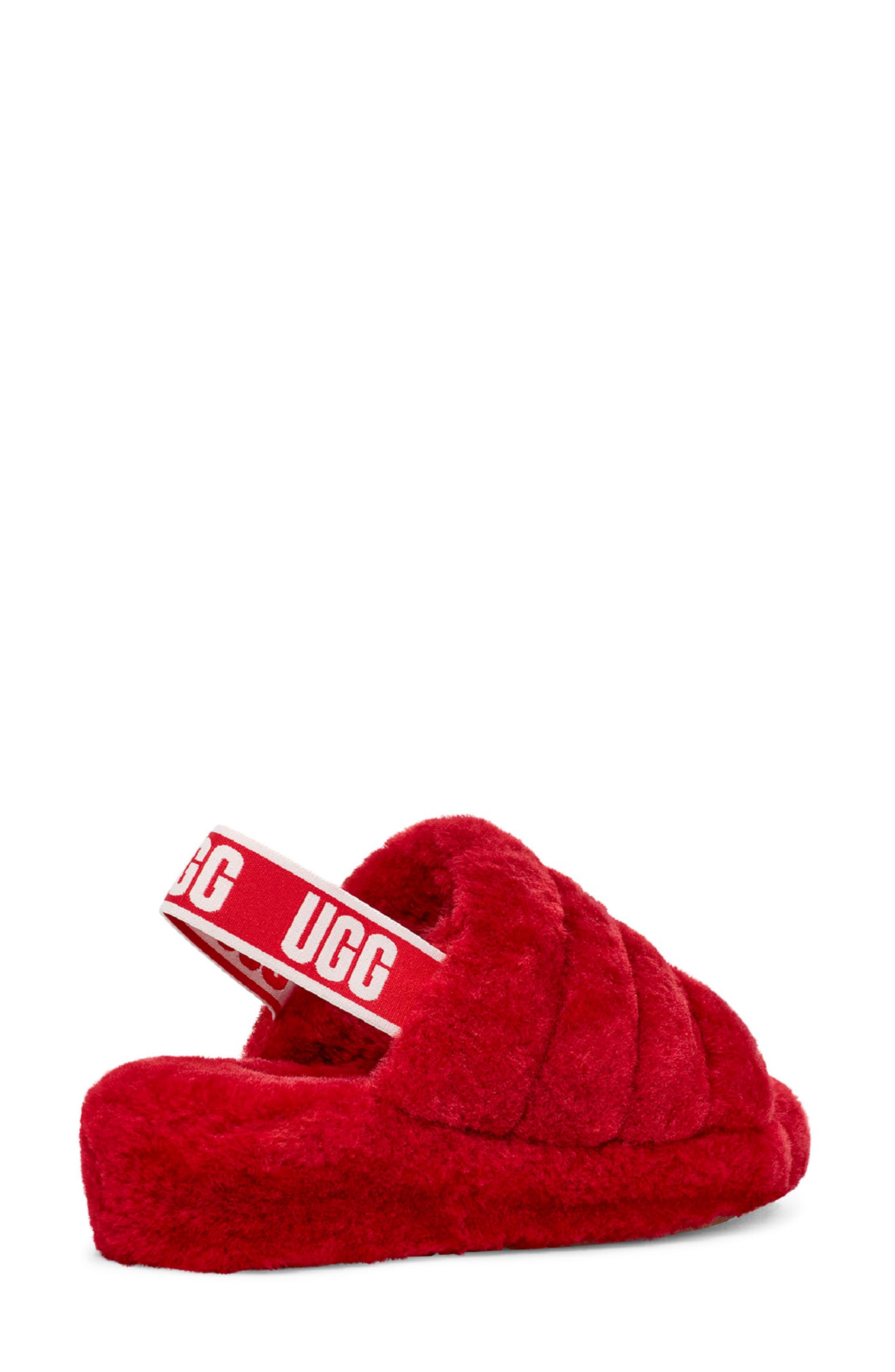 red fluffy ugg slides