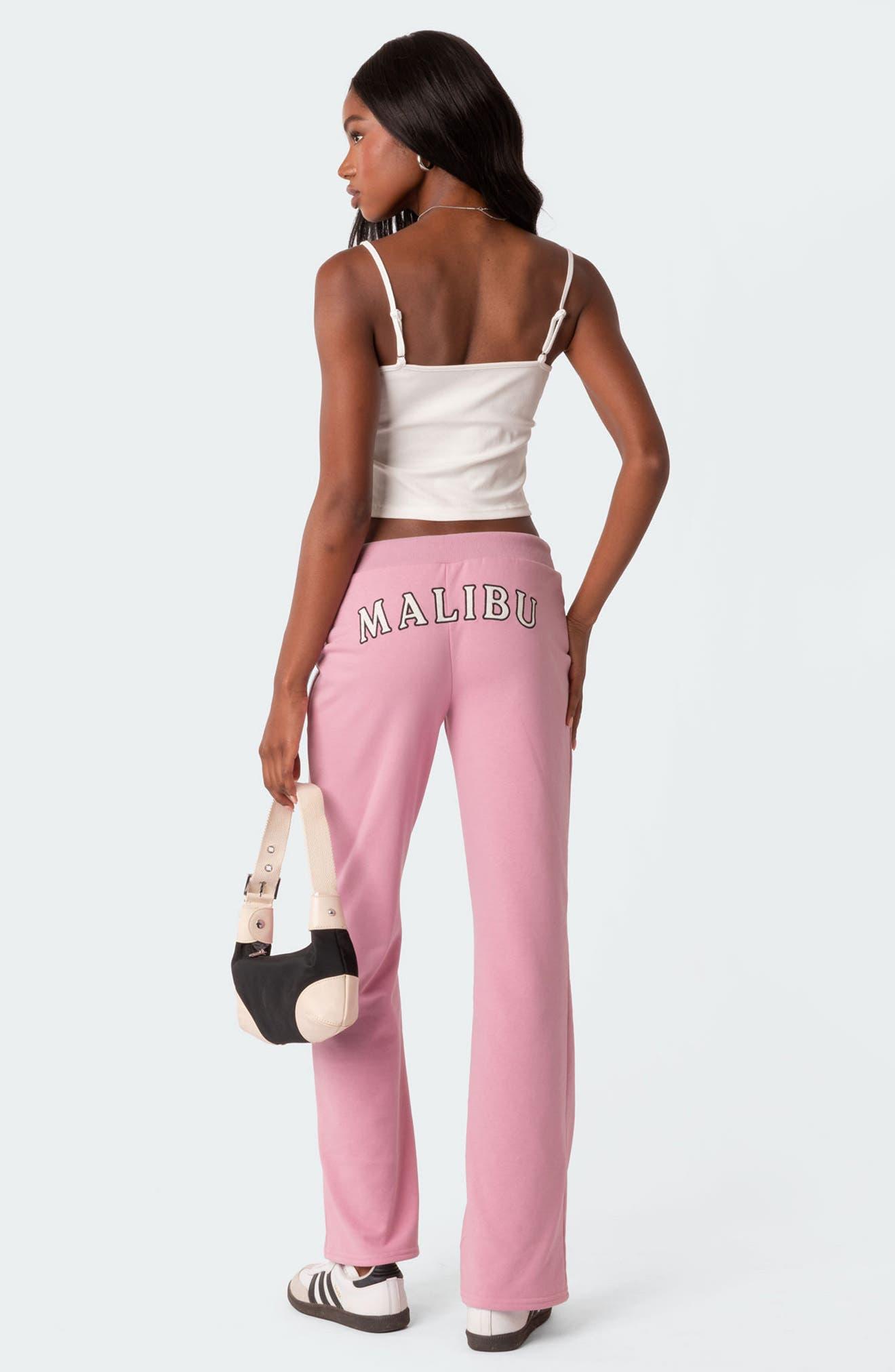 Edikted Malibu Low Rise Flare Sweatpants in Pink