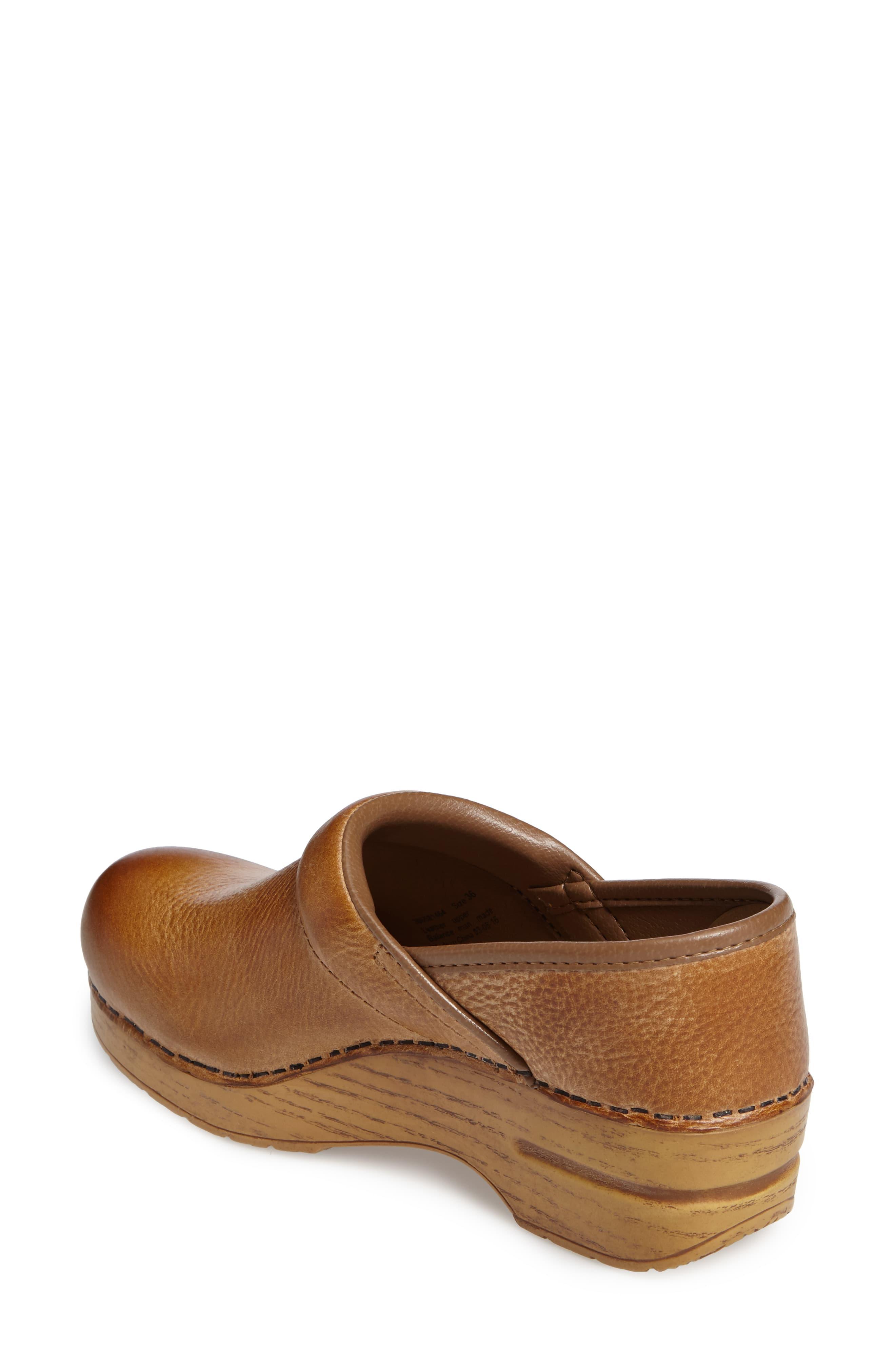 dansko distressed clog