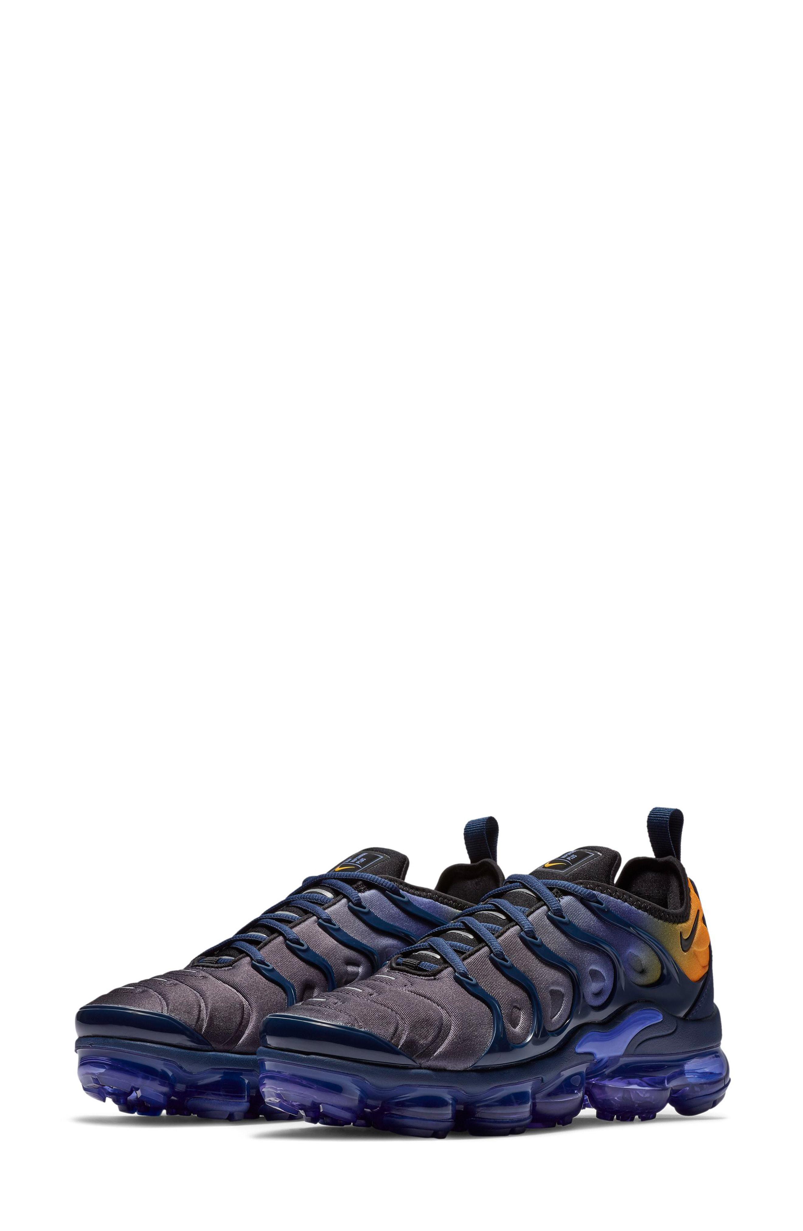 orange and blue vapormax plus