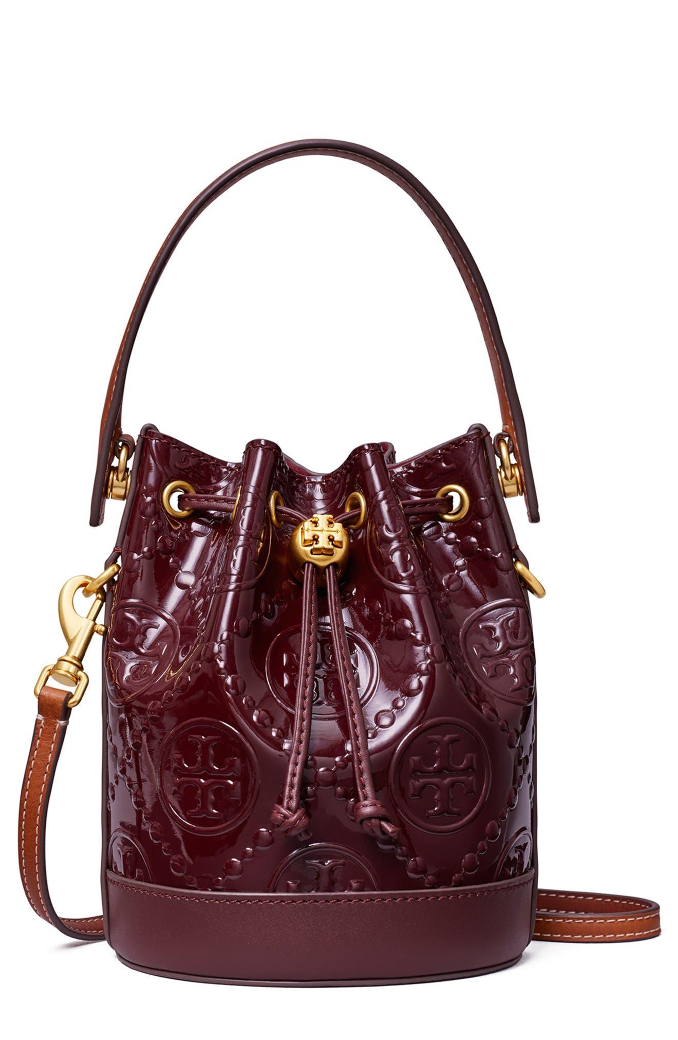 Monogram bucket patent leather handbag