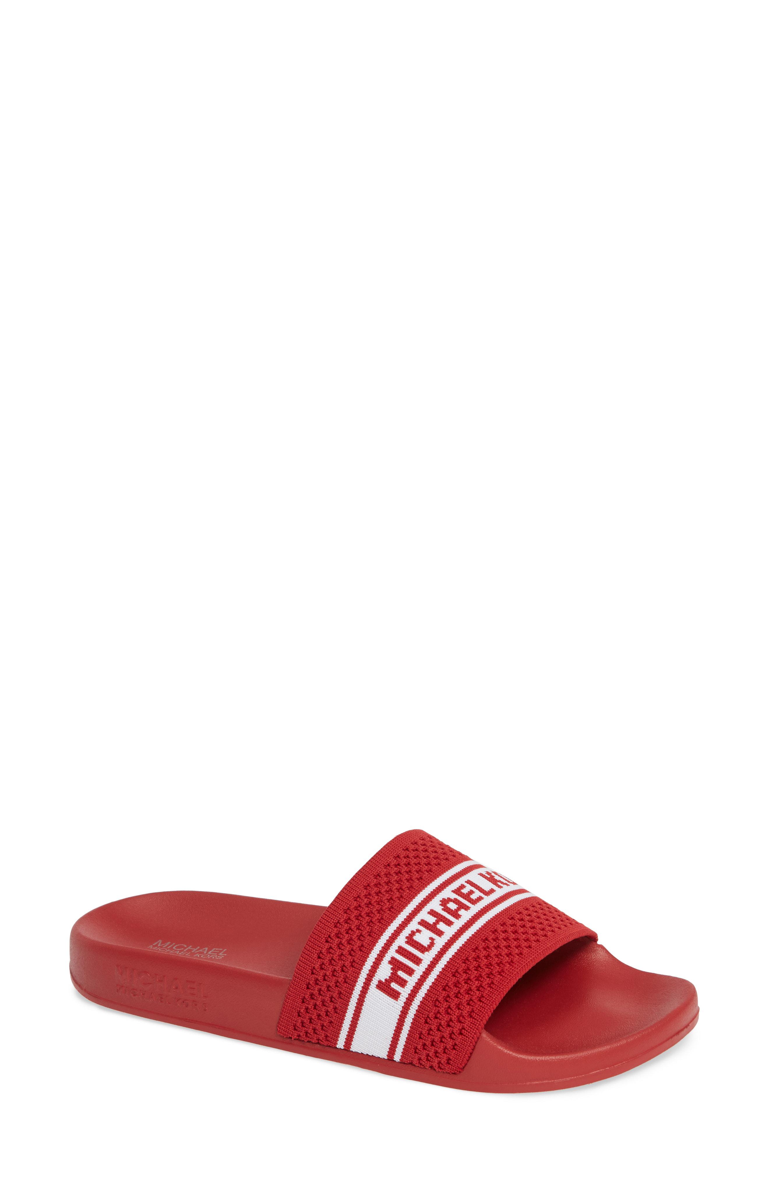 red michael kors slides