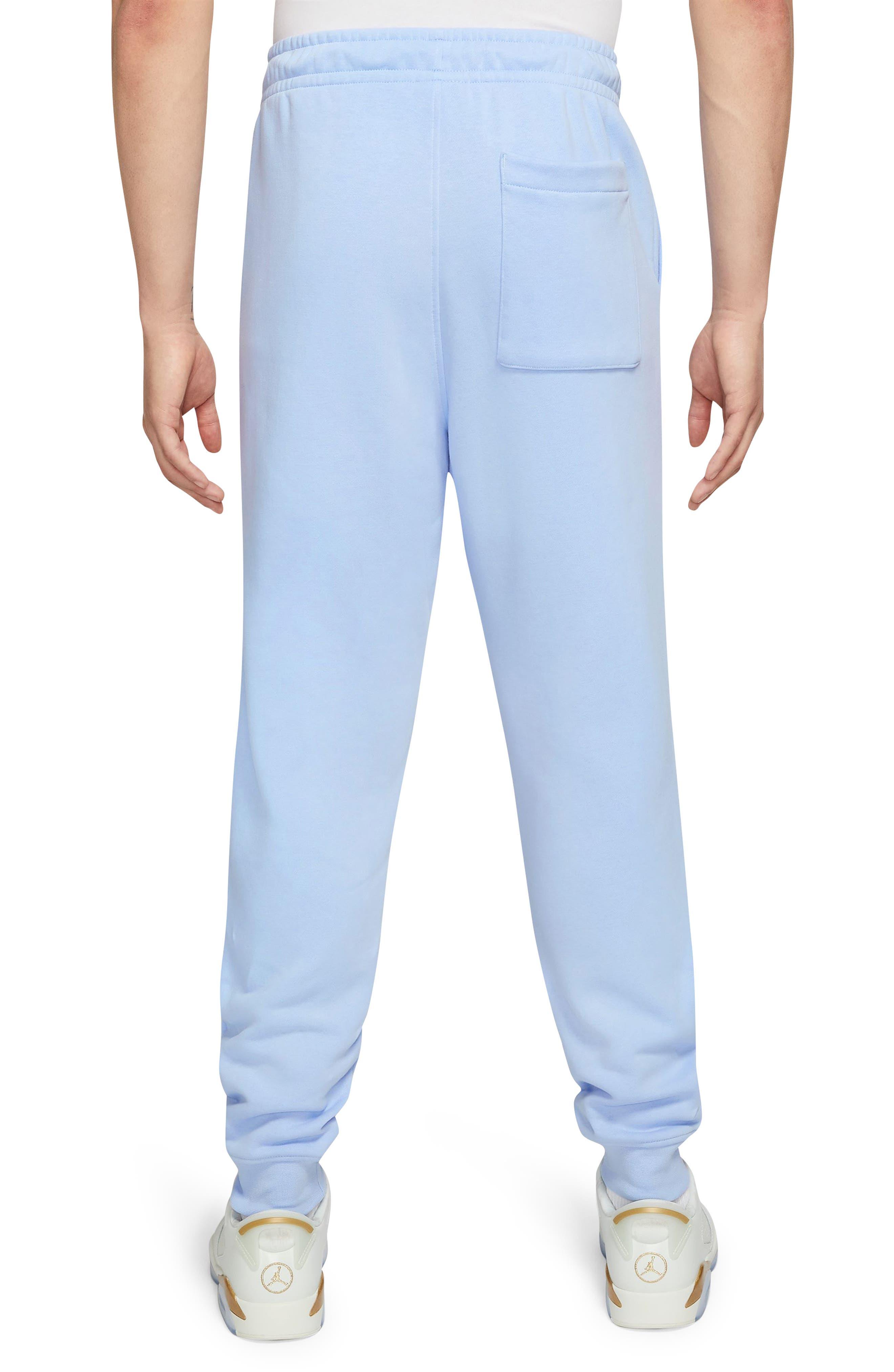 nike sweatpants light blue