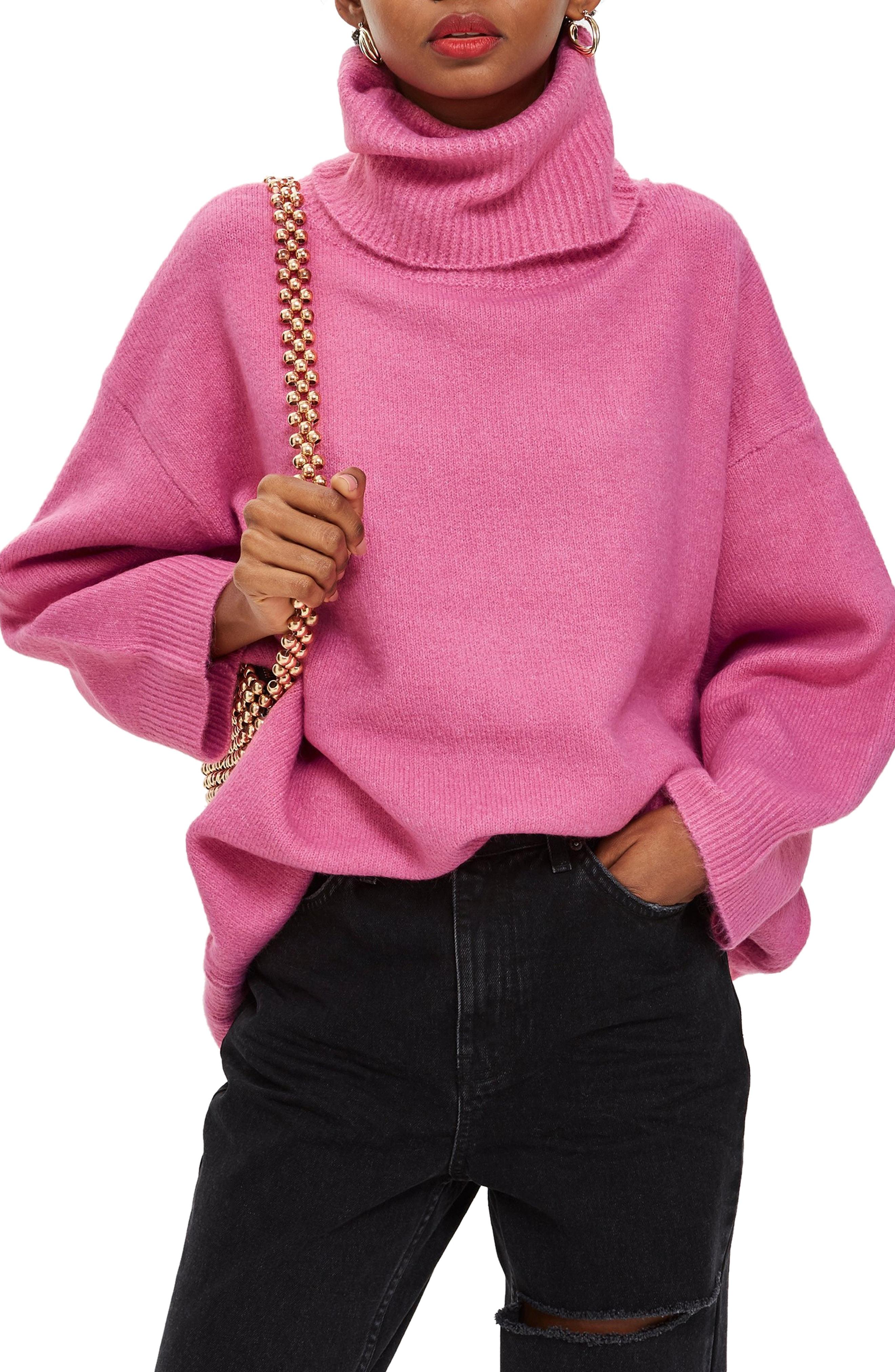 hot pink oversized turtleneck sweater