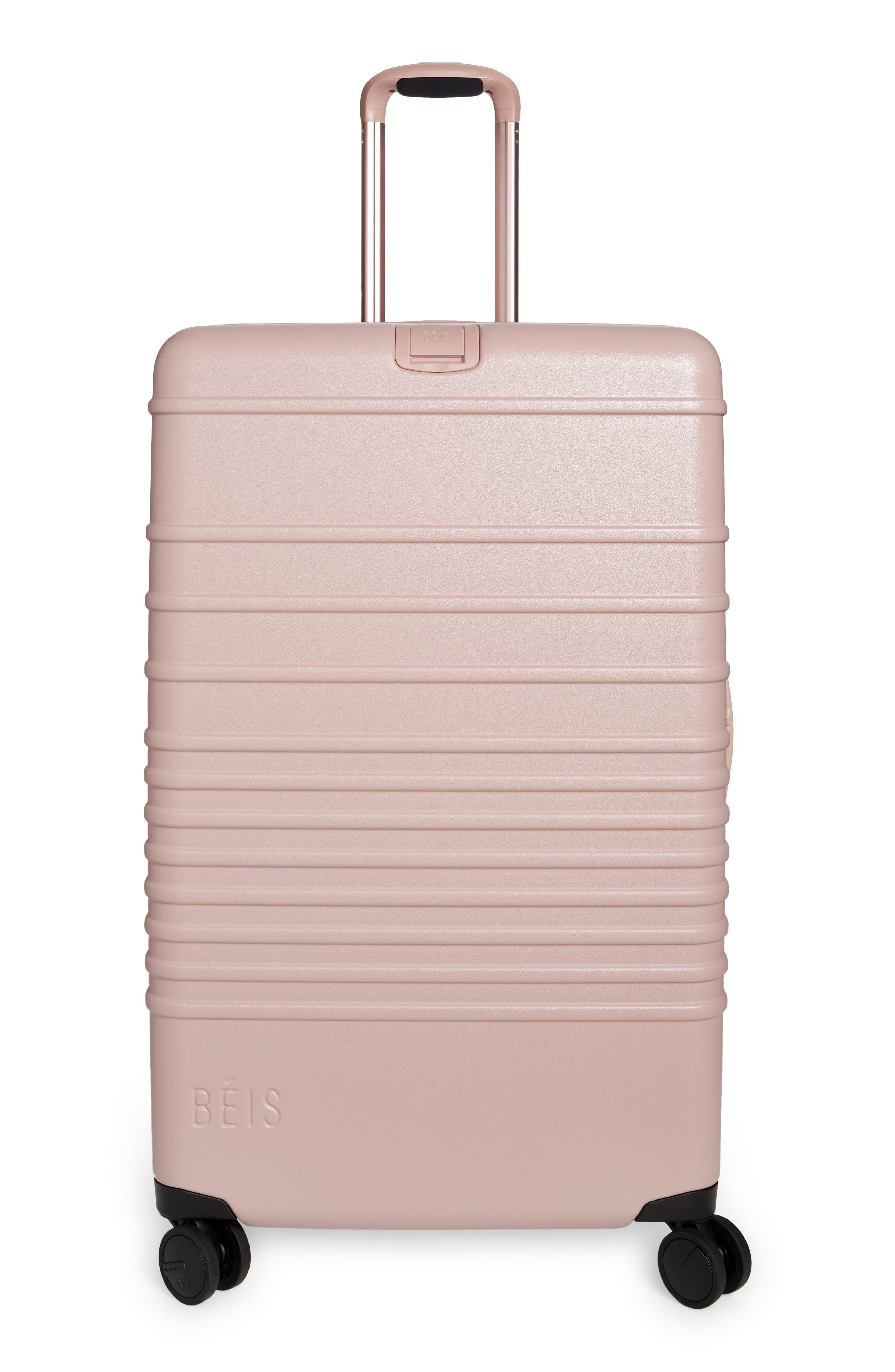 beis pink luggage