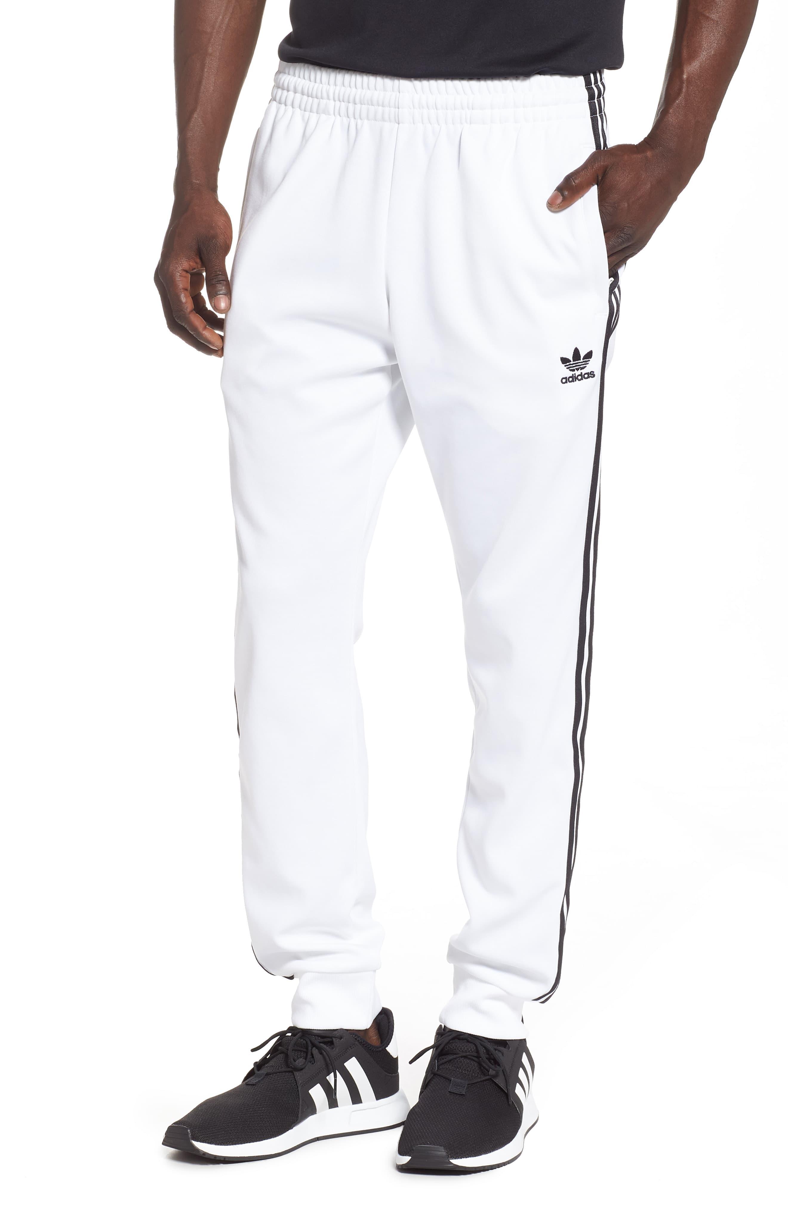 white adidas track pants mens
