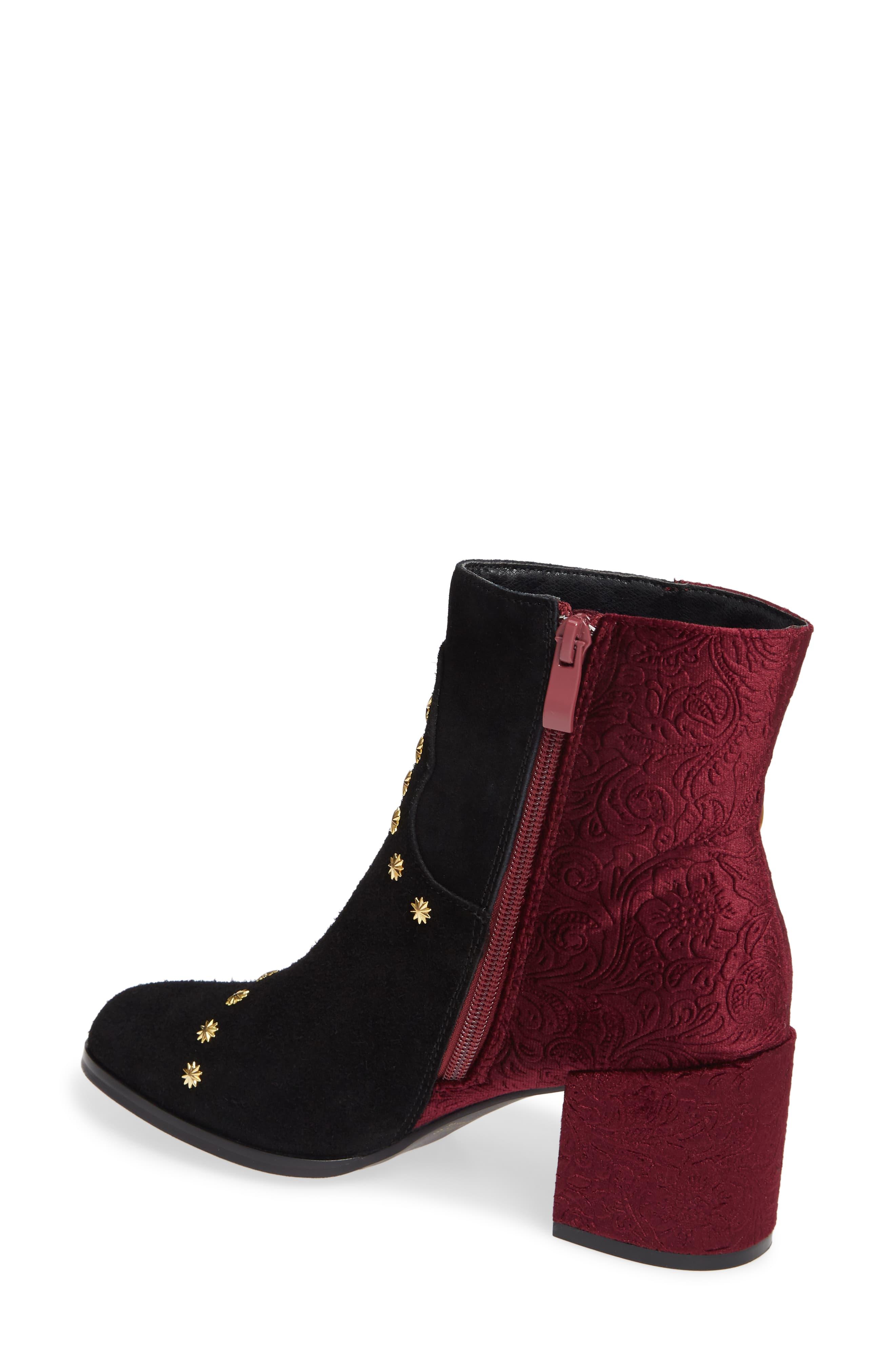 very volatile black booties