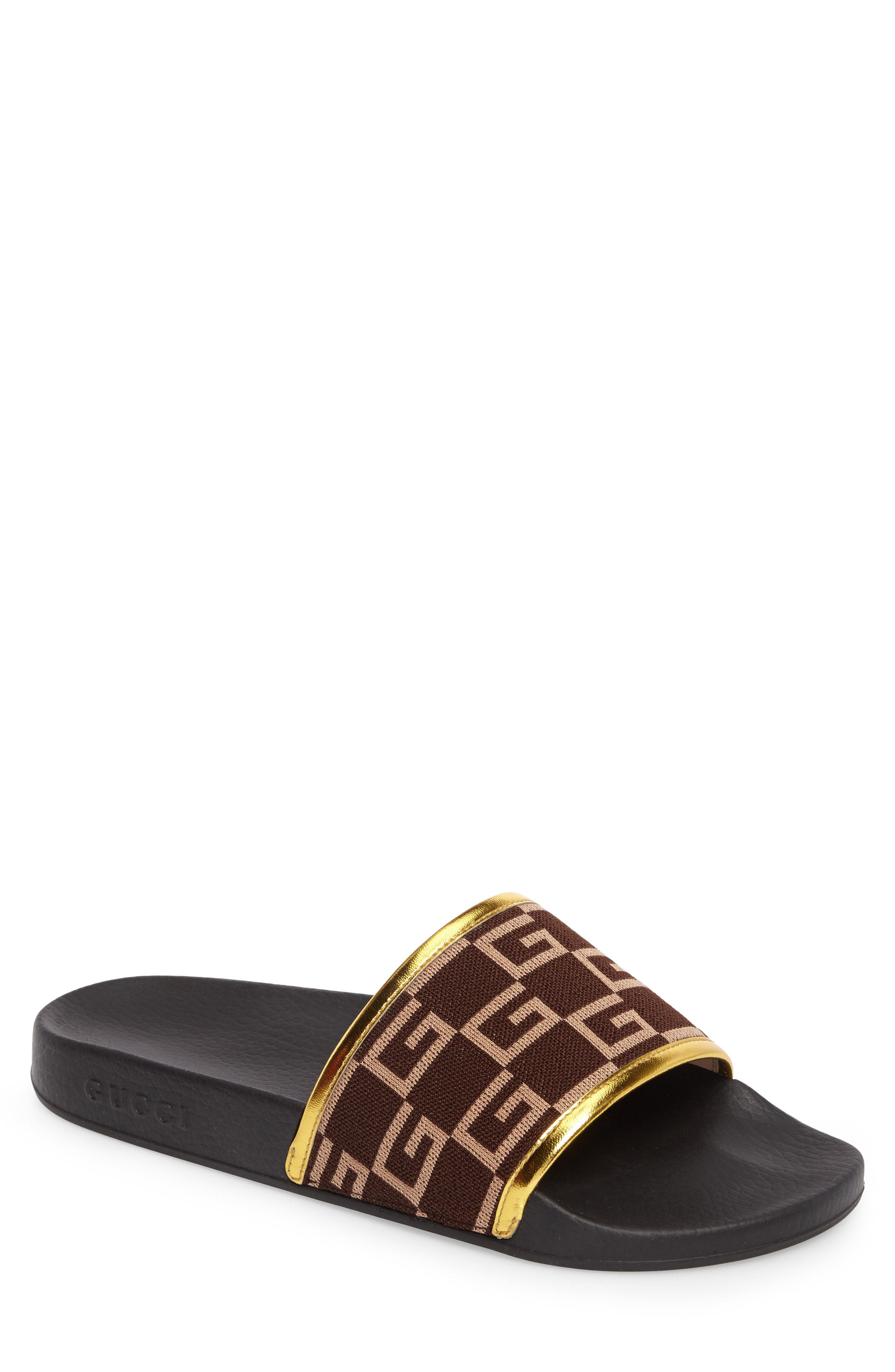brown and gold gucci slides
