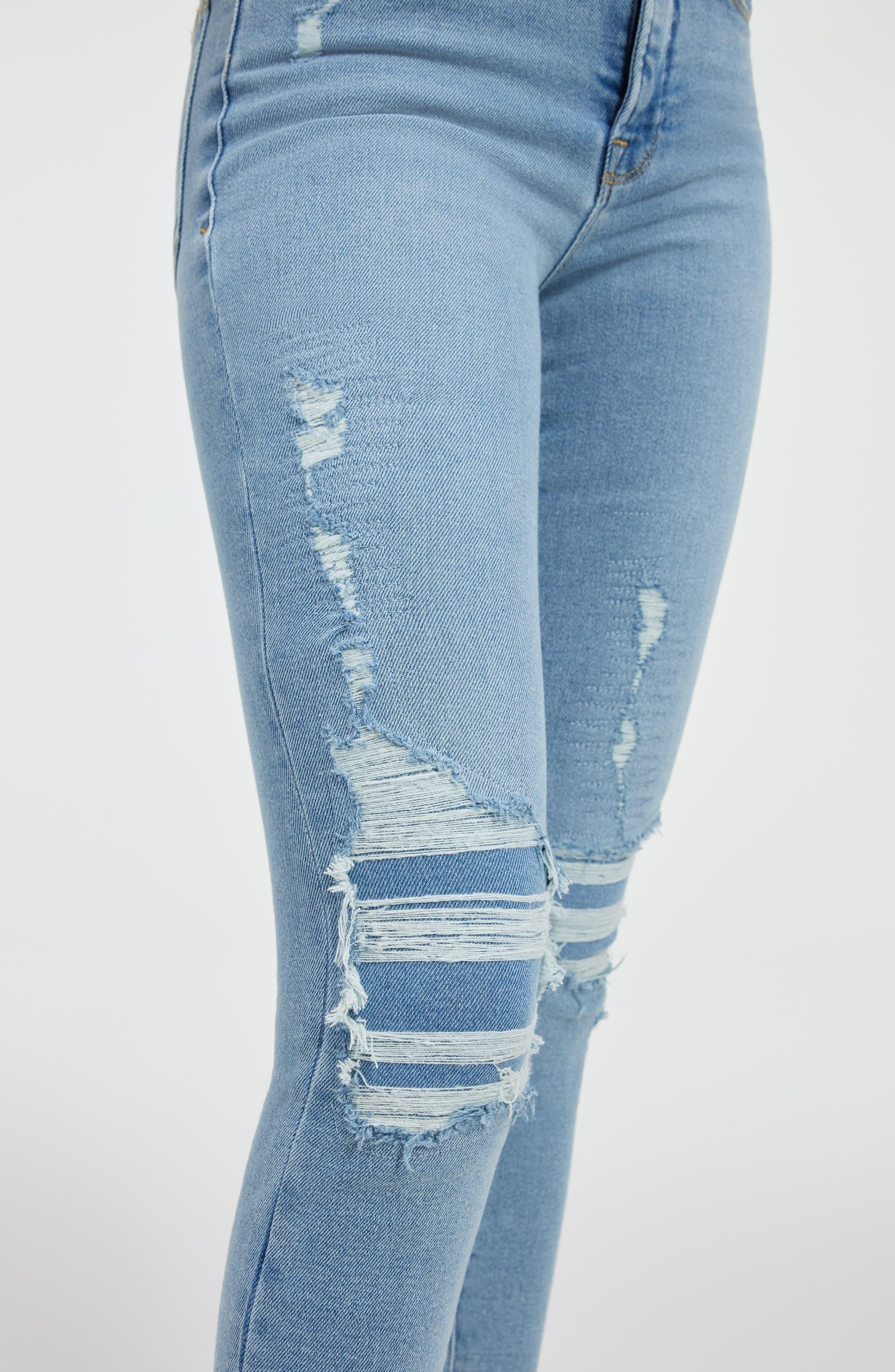 GOOD AMERICAN Good Legs Ripped Raw Hem Skinny Jeans in Blue | Lyst