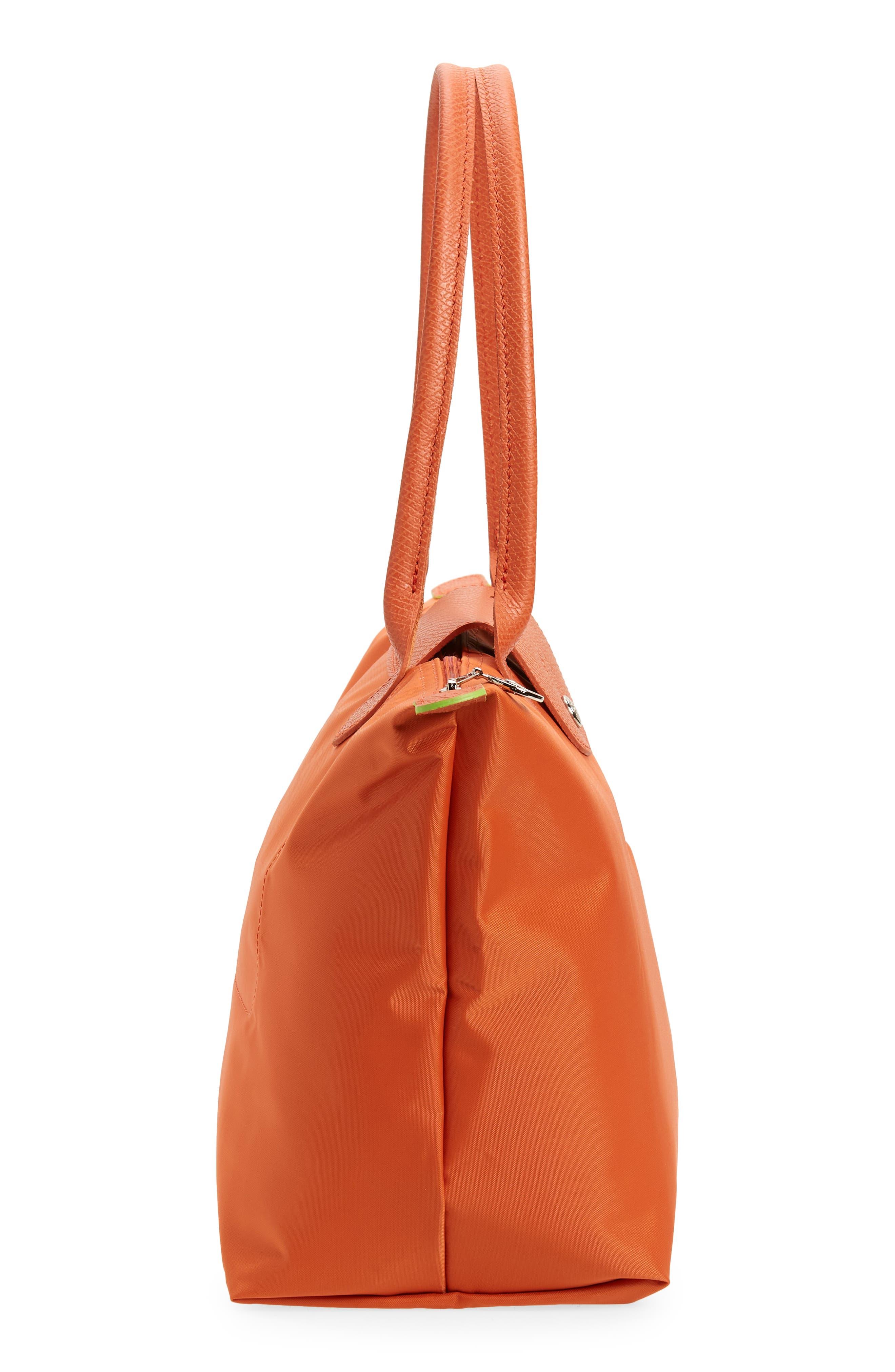 Longchamp Le Pliage Green Canvas Bag in Orange | Lyst
