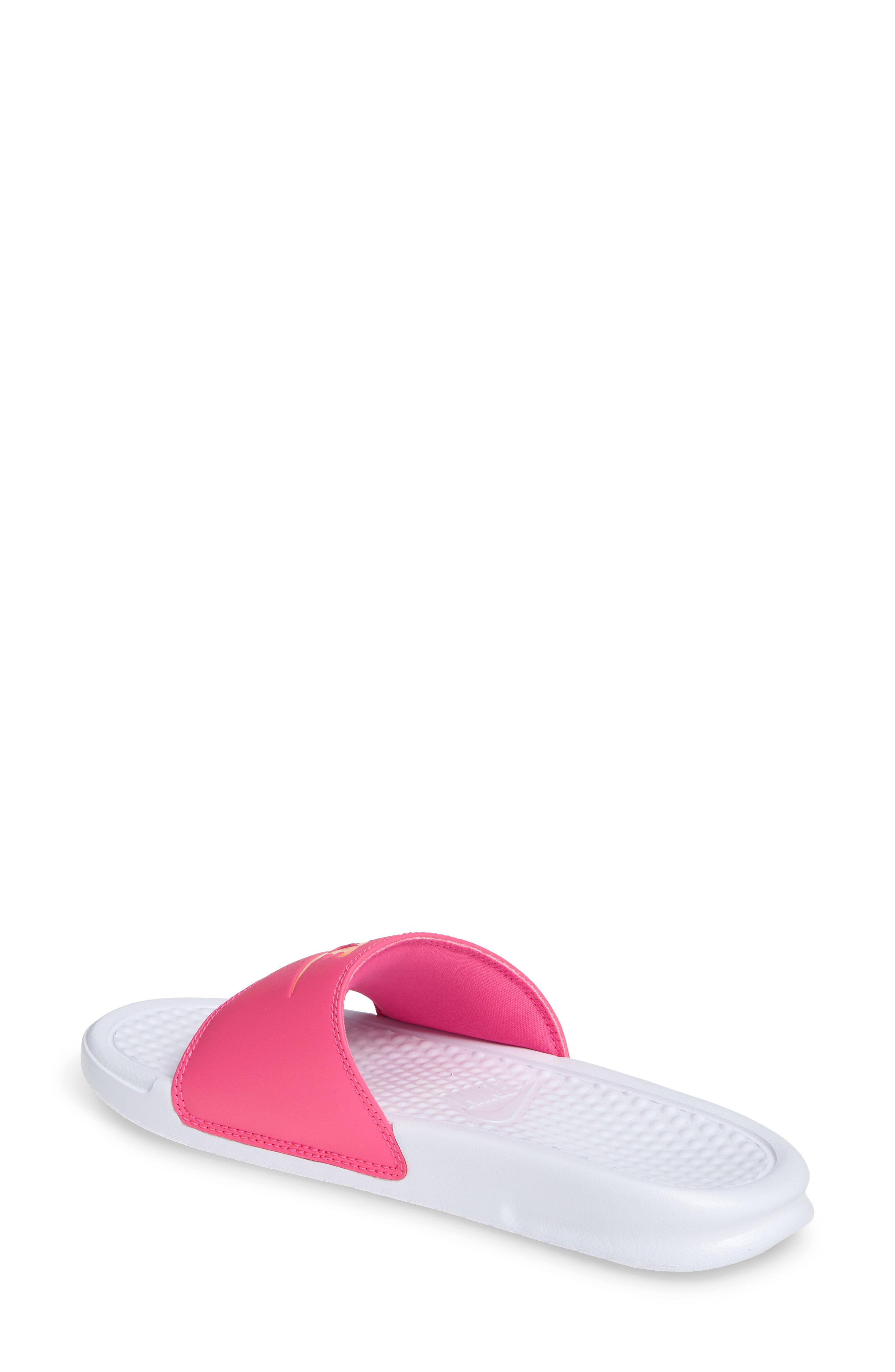 orange nike slides womens