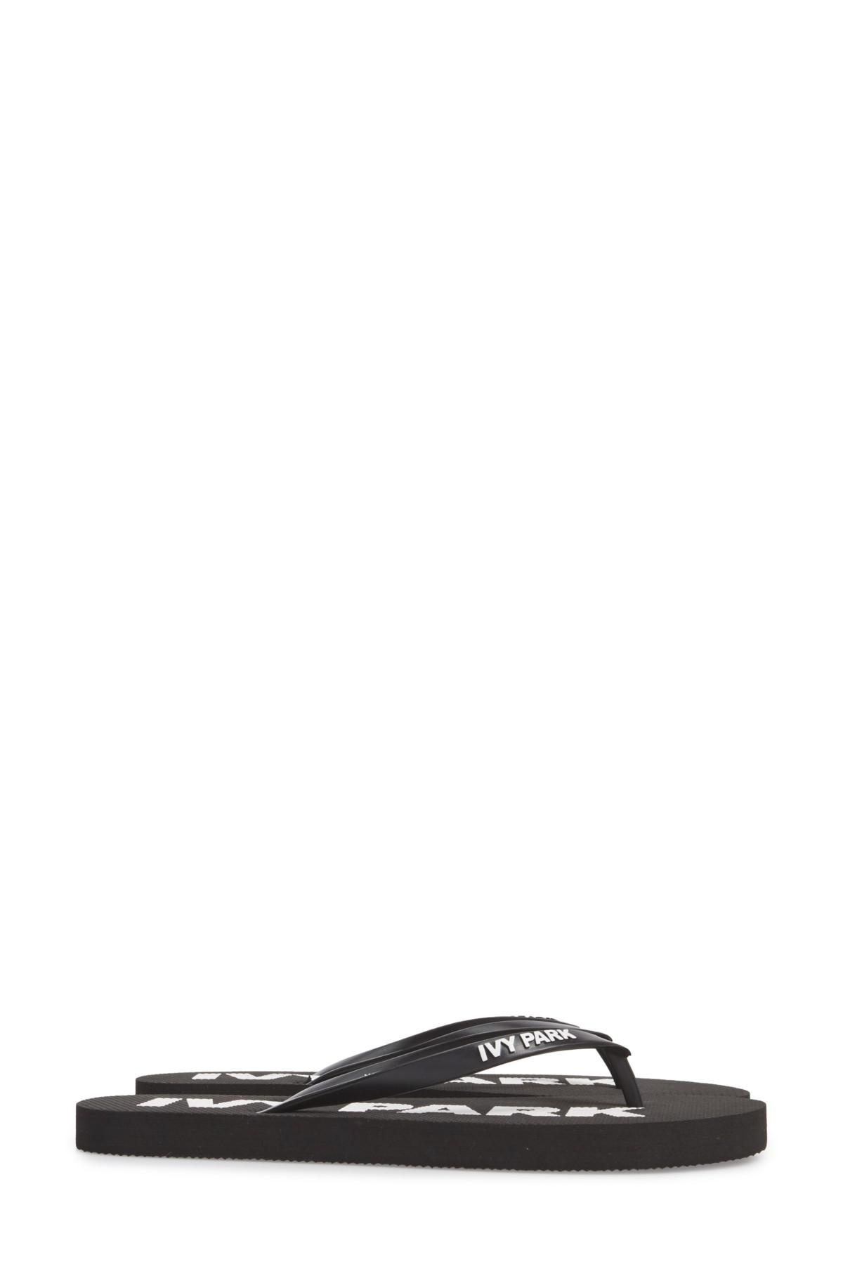 ivy park flip flops black