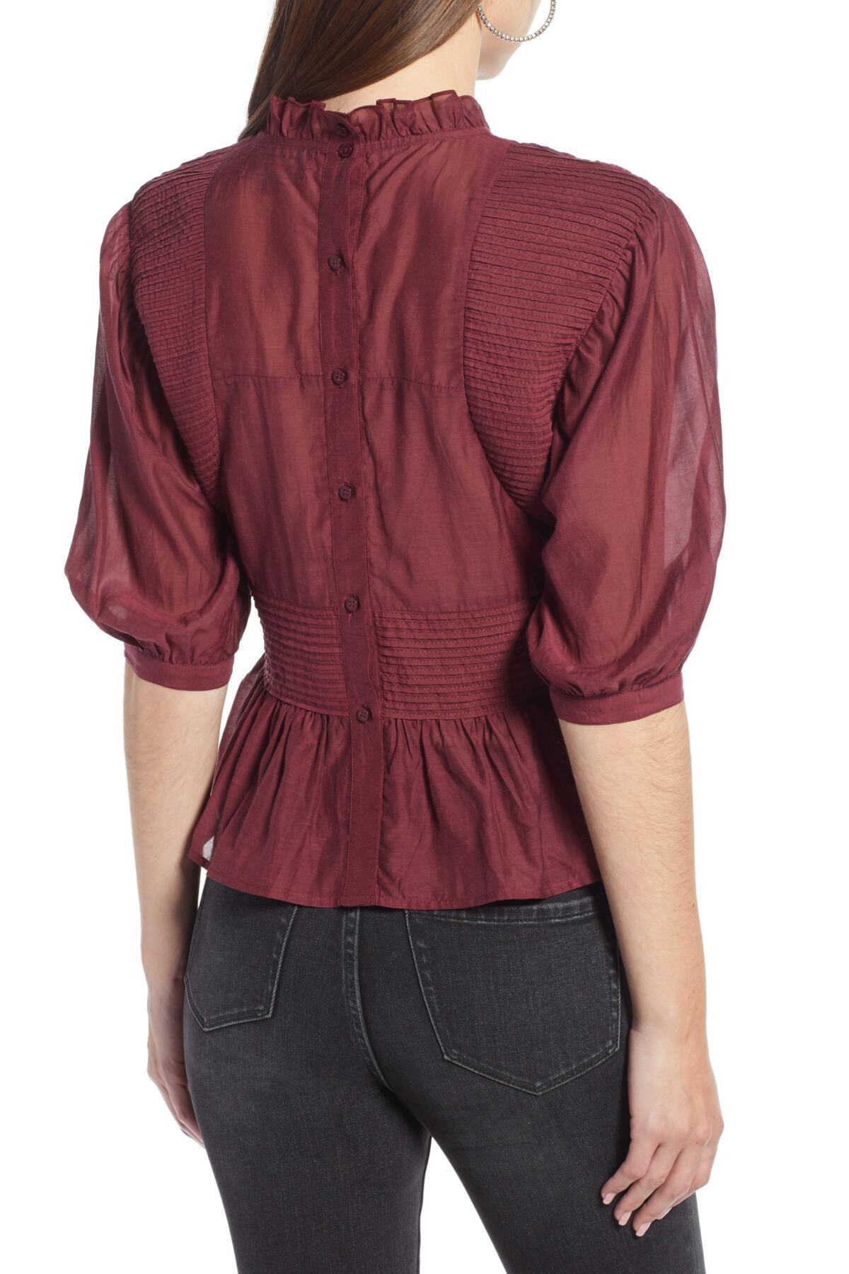 something navy pleated peplum top