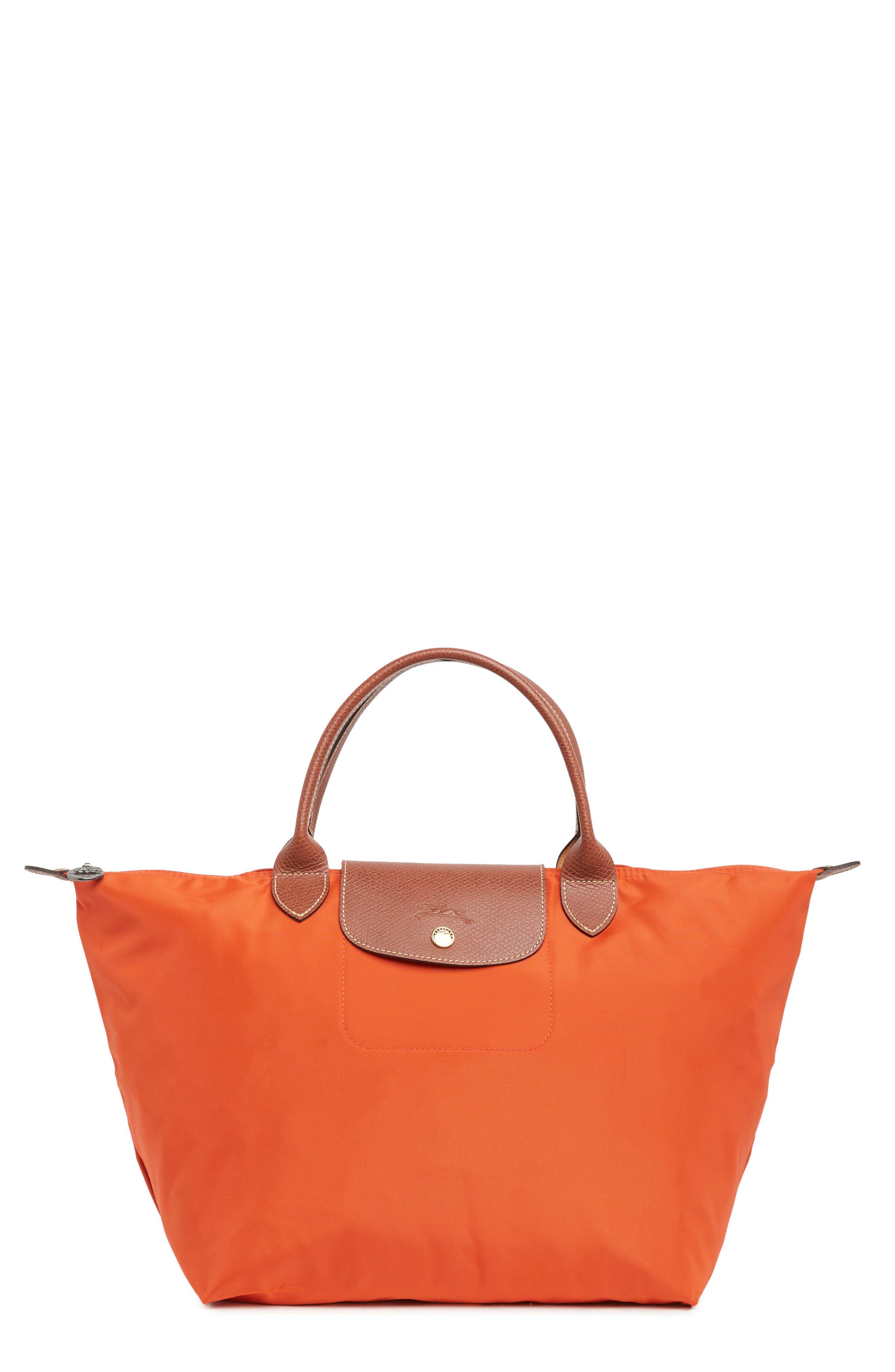 Longchamp Le Pliage Medium Top Handle Bag in Orange | Lyst