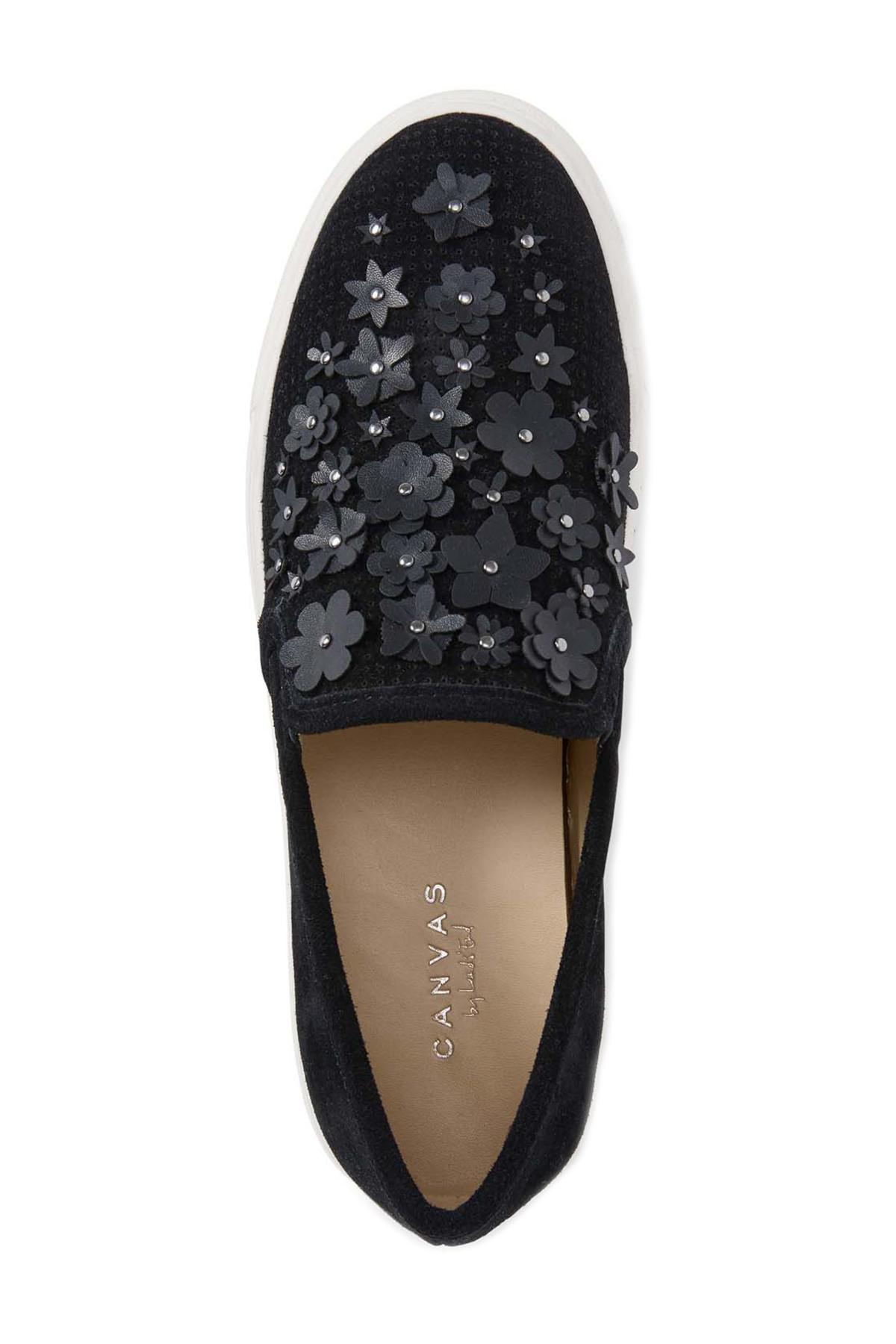 vans slip on pro raisin