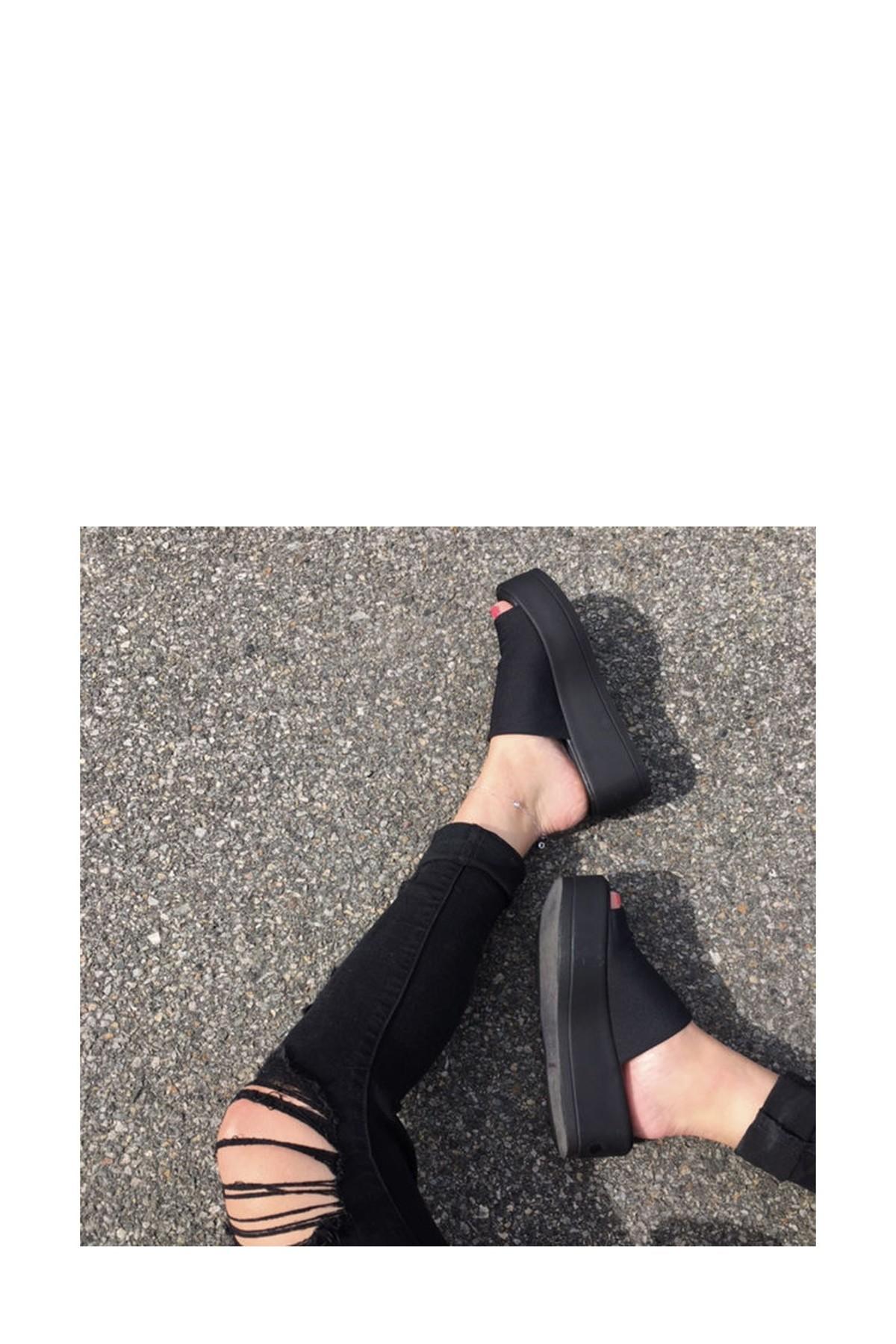 black slinky platform sandals
