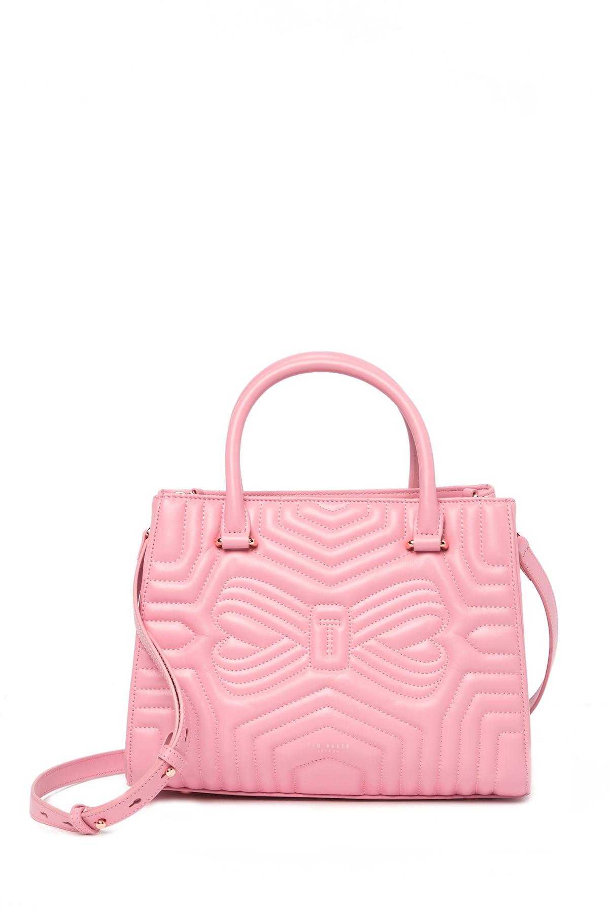 pink quilted leather handbag