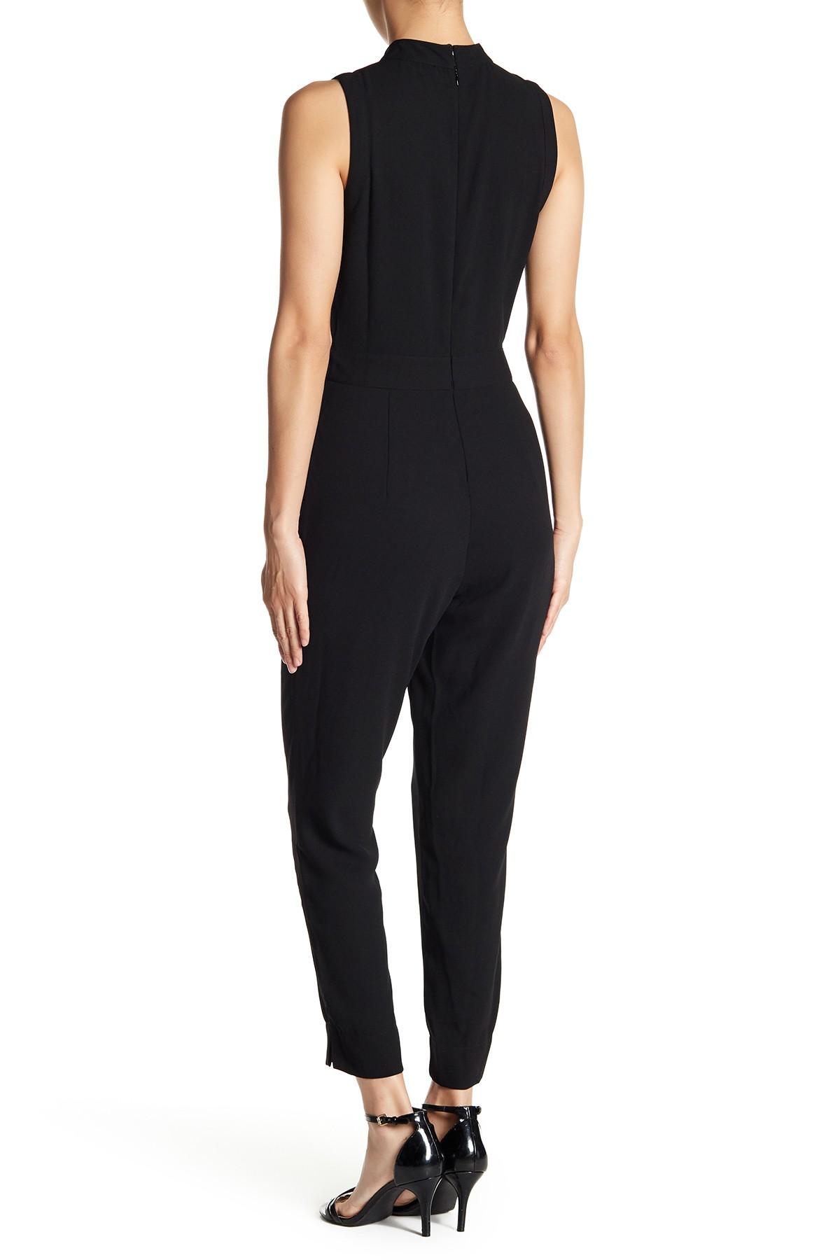 Download Bebe Synthetic Mock Neck Keyhole Jumpsuit in Black - Lyst