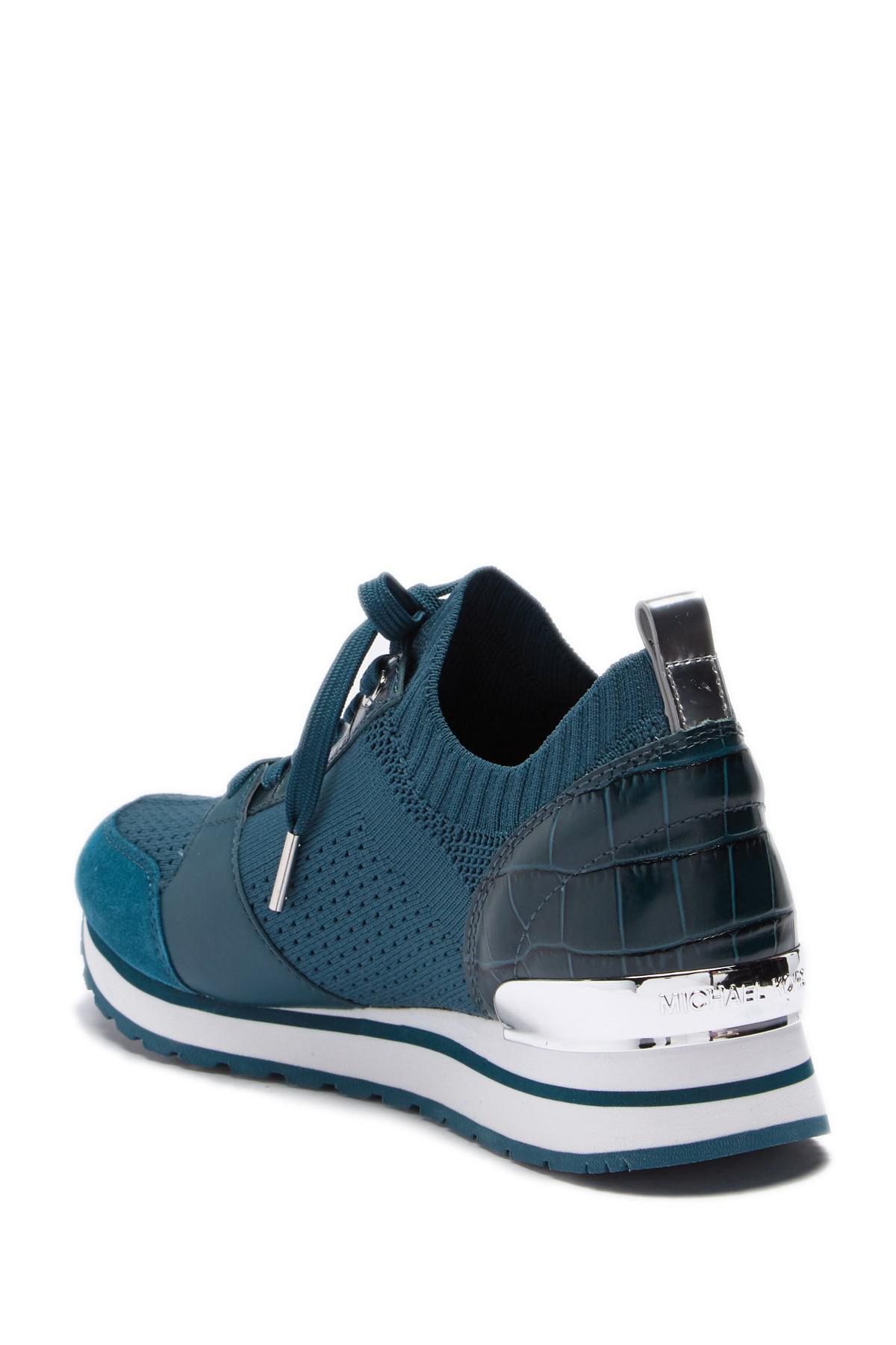 michael kors billie newsprint logo leather trainer