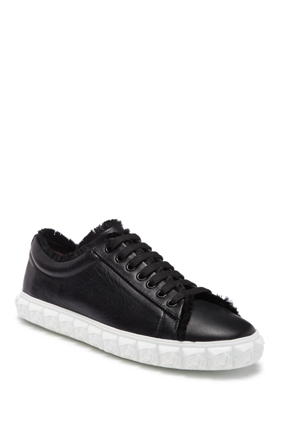 stuart weitzman fringe sneakers