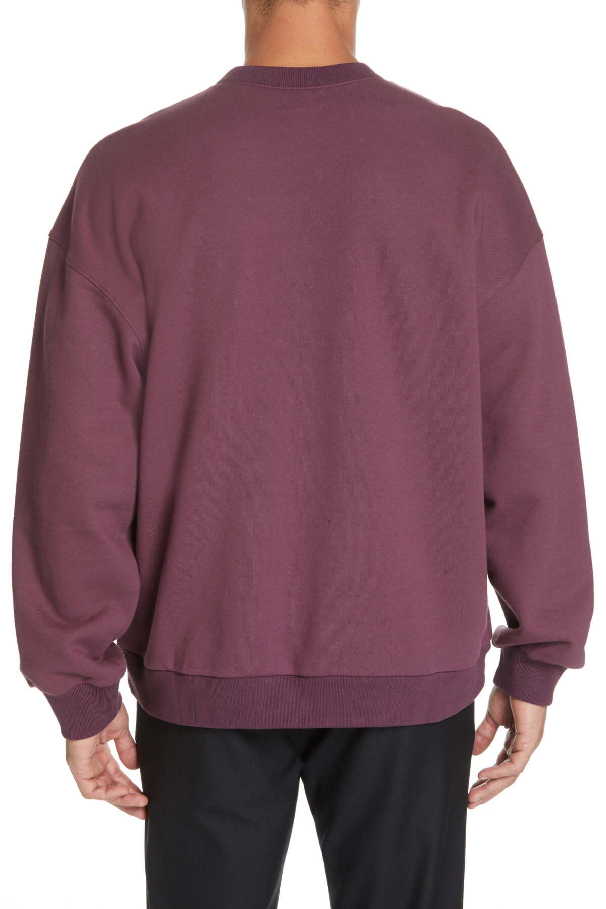 purple crewneck sweatshirt